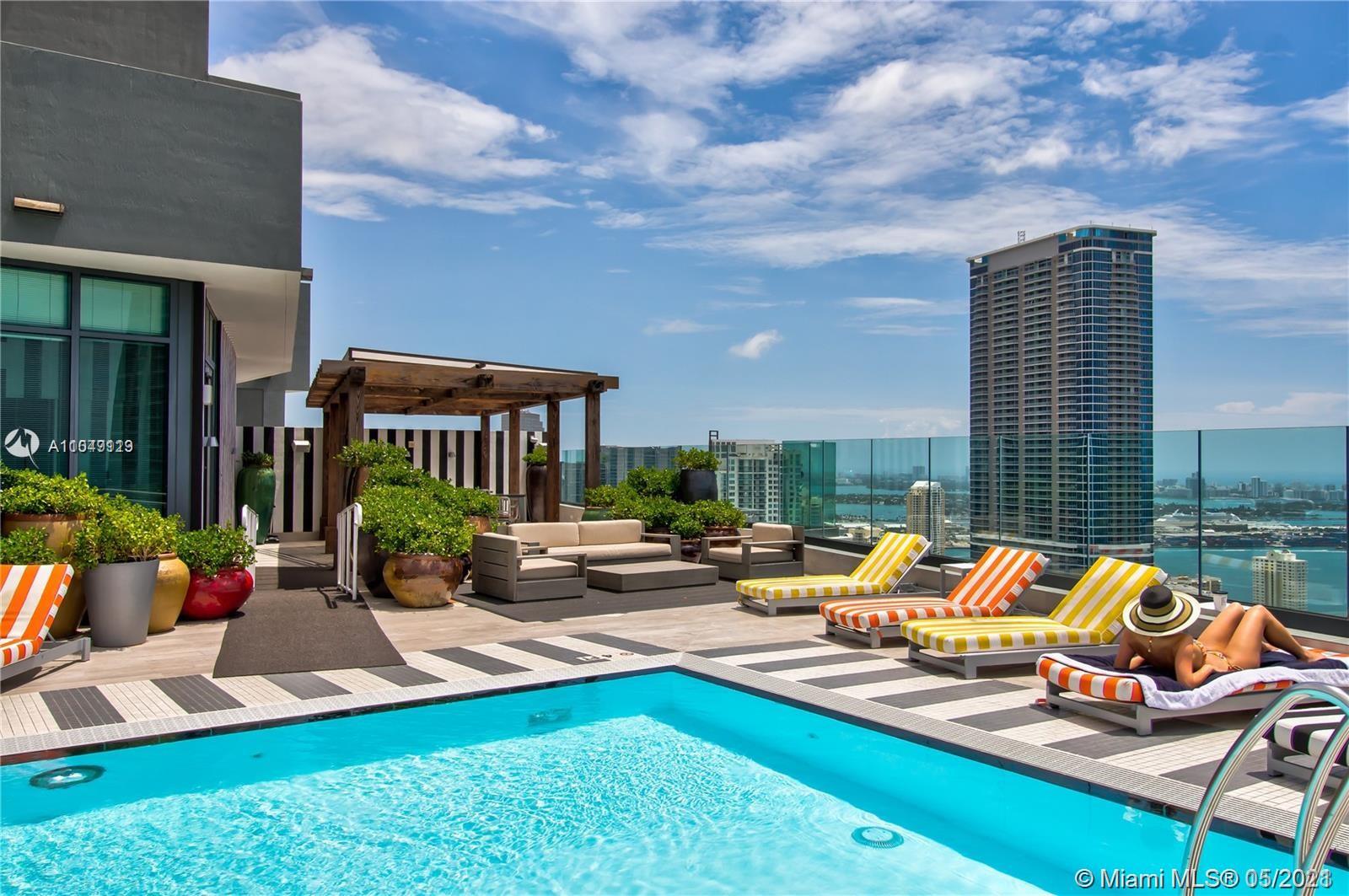 Amazing 2 Bedrooms and 2 Baths + den with stunning panoramic views to Miami Skyline, the Bay and the Ocean at the SLS Residents with an oversized terrace. Not only would you enjoy the 5-star amenities but also the exclusive membership access to the prestigious beach club in the SLS Hotel Miami Beach. Amenities include rooftop pool, spa, fitness center, movie theater & game room. Very exclusive and high-end building.