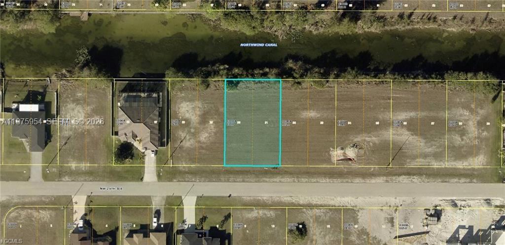 Build your dream home in one of Cape Coral’s fastest-growing areas! This prime vacant lot at 1247 NW 24th Ter is perfectly positioned in the desirable NW Cape, surrounded by newer homes and ongoing development. Whether you're a builder, investor, or future homeowner, this property offers incredible potential in a location that continues to see strong growth. Enjoy close proximity to the exciting Seven Islands project, Coral Oaks Golf Course, and easy access to Burnt Store Road for convenient travel to Punta Gorda, I-75, shopping, dining, and entertainment. With plenty of space to design the home you’ve been envisioning, this lot gives you the opportunity to create your own slice of the Southwest Florida lifestyle. Don’t miss your chance to secure a piece of Cape Coral’s expanding market — invest today and build tomorrow!
