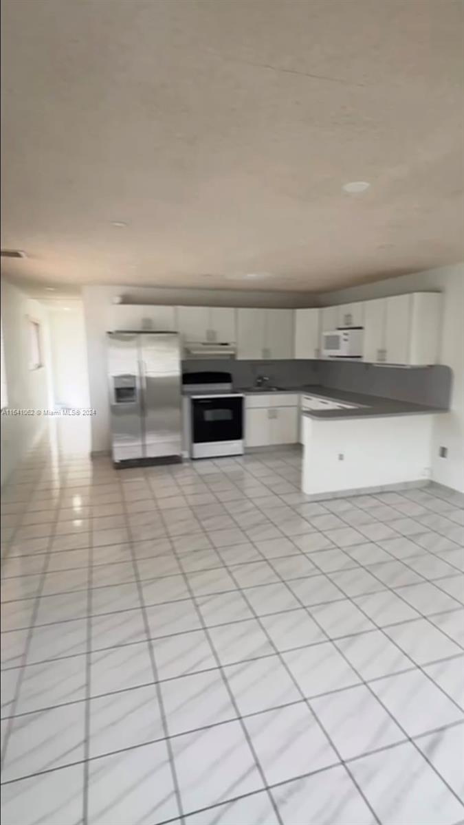 S MIAMI HEIGHTS ADDN C - Residential Lease