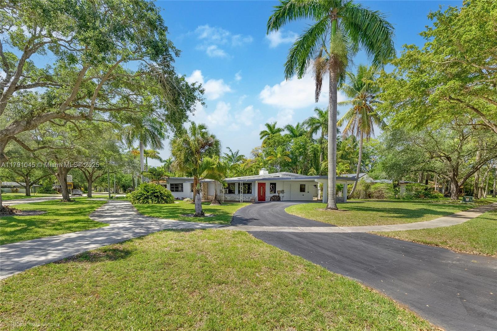 Nestled in the heart of the historic and highly-desirable area of Plantation Gardens, this rare 3/2 Mid-Century Modern gem is now available for the first time in nearly 30 years. Steeped in timeless charm, this 1950s-era classic sits on a huge corner lot, offering ample space for expansion, or the yard of your dreams. Enjoy the serenity of a quiet, tree-lined street, while being near to shopping, dining, and access to the Turnpike. The possibilities are endless with this expansive property, whether you're looking to preserve the home's original character or make it your own with a personalized renovation. This is truly a once-in-a-lifetime opportunity to live in a peaceful, private setting in the midst of a neighborhood rich with mid-century modern elegance. Don't miss out!