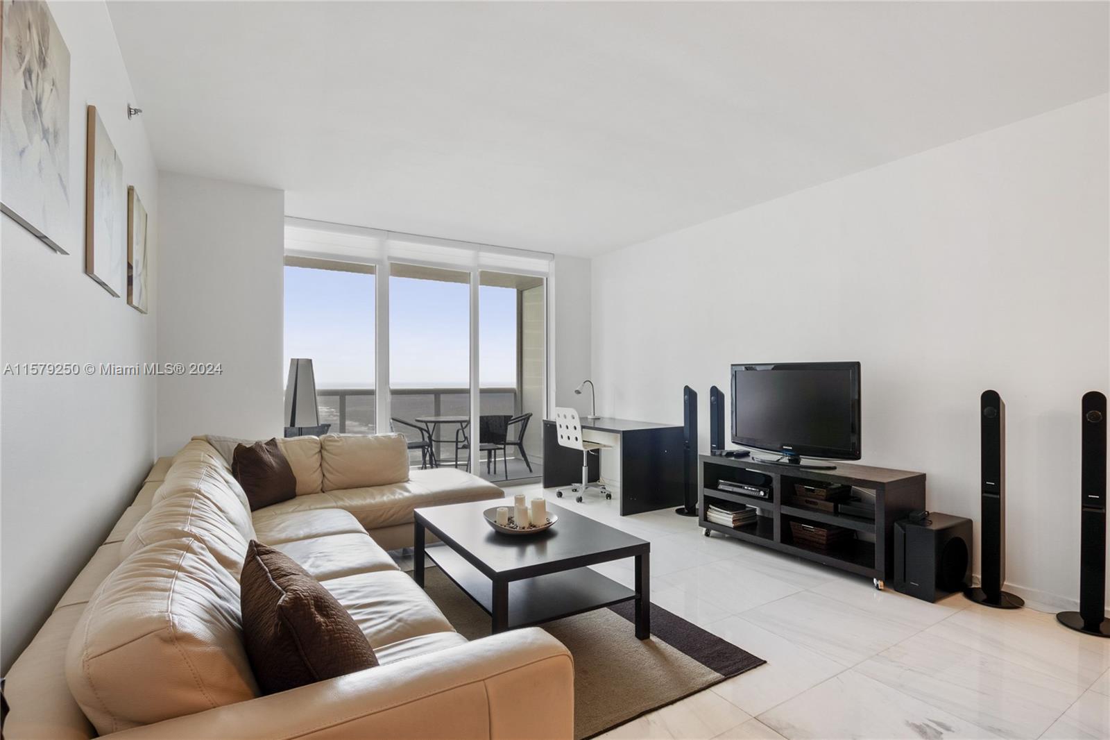 Fully furnished unit featuring 2 bedrooms plus a den, 2 full baths, and elegant marble floors. Northeast exposure provides stunning views. Experience the Beach Club lifestyle, offering ultimate luxury at an exceptional price point. The building boasts 5-star resort-like amenities, including a full-time concierge, 24-hour valet parking, 3 heated pools, and a 50,000 sq. ft. spa & fitness center, complete with a poolside bar.