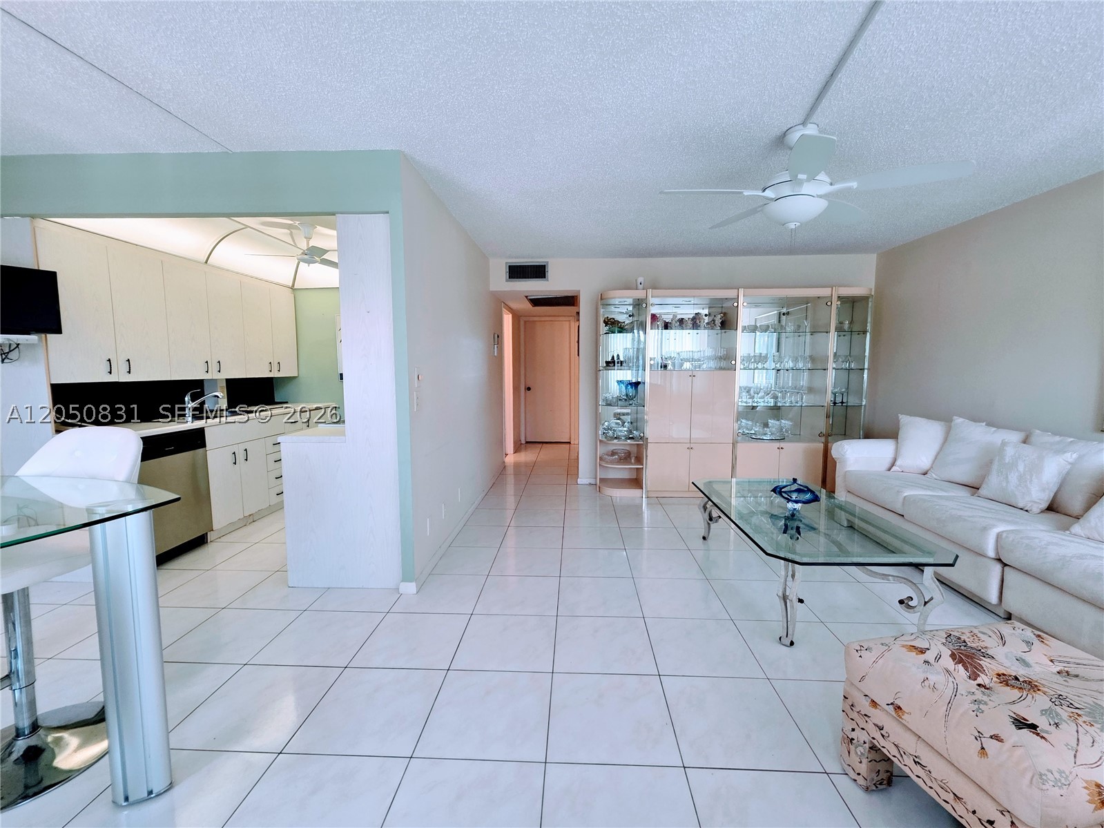 Discover serene lakefront living in this beautifully maintained 2-bedroom, 1.5-bathroom home. The updated bathrooms feature a sleek walk-in shower no tub,  offering both style and convenience.

The true highlight is the enclosed patio, your own private retreat where you can unwind, relax, and take in the breathtaking lake views.

This unit includes one assigned parking space and a storage cage conveniently located in the laundry room.

Century Village offers a resort-style lifestyle with an impressive array of amenities including a fitness center, live shows, movies, courtesy buses, classes, bingo, card rooms, trips, tennis, and pickleball. Ideally located near shopping and dining.

Come see the home, then experience the clubhouse for yourself, you’ll understand why so many love living here.

Per the association, this is a 55+ community.

This is a must-see!
