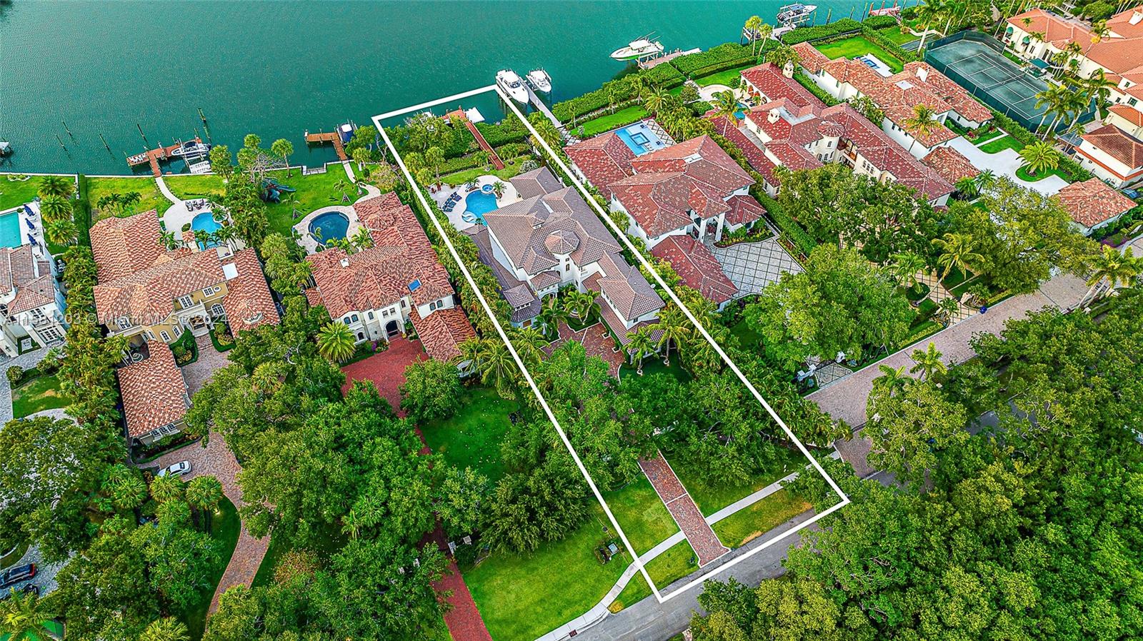 Discover unparalleled luxury at 337 Old Jupiter Beach Road, an exquisite 5-bedroom, 6.5-bathroom grand waterfront estate nestled in the tranquil and prestigious Sanctuary Bay neighborhood of Jupiter. Situated on a tranquil and private lot with 90 ft of direct Intracoastal waterway frontage, the property on nearly 3/4ths of an acre boasts breathtaking views across a protected preserve of Fullerton Island. The well-designed outdoor space includes a covered patio, an outdoor kitchen, and a luxurious pool and spa, perfect for entertaining or private relaxation by your own private sandy beach area. This custom-designed property offers privacy and elegance on one of the area's most idyllic streets with no through traffic, setting a new standard for high-end living.