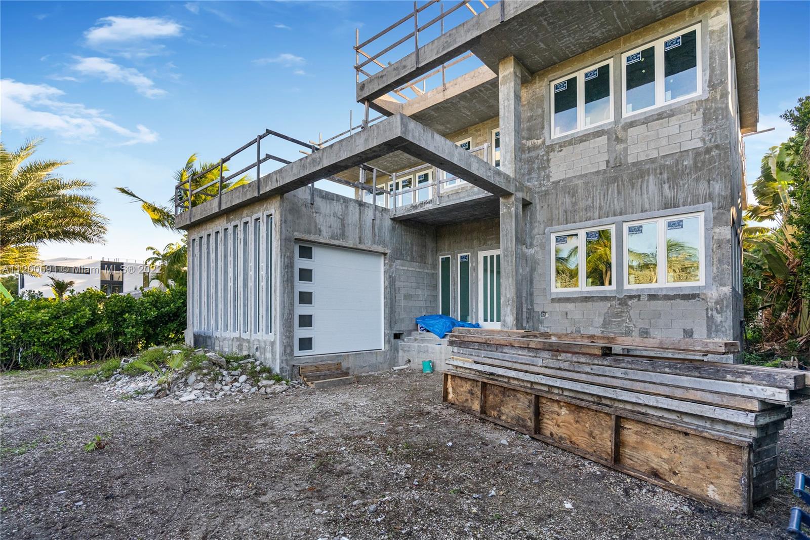 Great opportunity to take over and complete a beautiful, modern, new construction project facing Miami Beach Golf Course. Great layout with 2 beds + plus staff room downstairs and 2 big bedrooms with en-suite baths & spacious master suite wrapped by oversized terrace upstairs. Dramatic living space enjoying 12-foot ceilings and a giant great room leading out to a private pool area. Big, 10,400 square foot lot. Excellent location within a short walking distance to Lincoln Road, Sunset Harbor, and the ocean. Certain conditions apply. Call for plans and details.