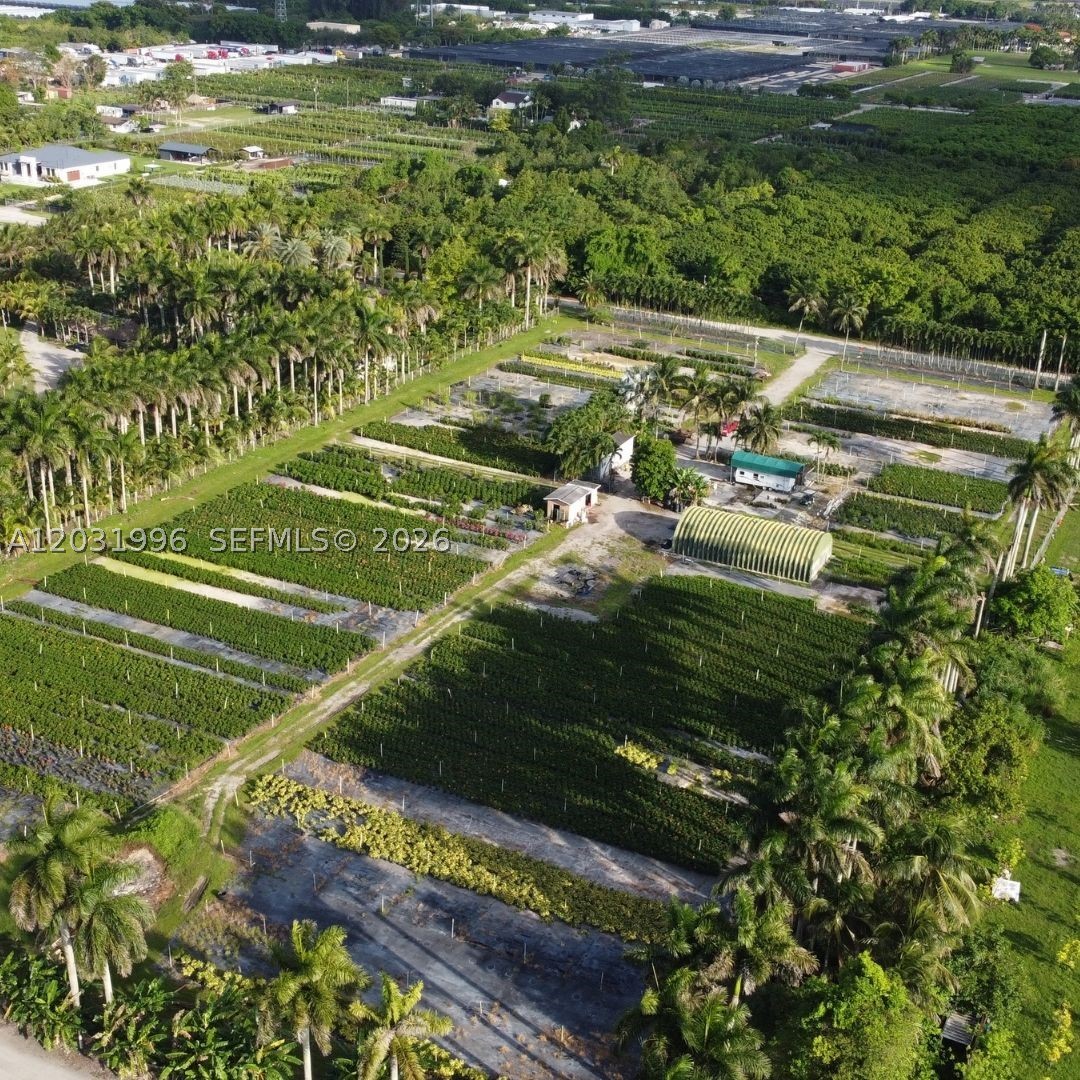 Prime 4.81-acre agricultural lot available for lease, strictly zoned for nursery operations to maintain the Ag-Exemption. The property is fully fenced with a secured entrance and single-phase electricity. Included structures: a 30x56 metal warehouse with concrete floors, interior electricity, and shelving, plus a 12x35 office trailer with working A/C. The commercial irrigation system is powered by a diesel pump with a 500-gallon tank. The lot will be delivered completely cleared of the current tenant's inventory. Move-in requires 1st month and 2 months security deposit. Tenant is strictly responsible for all equipment maintenance and repairs. Available on July 1st. Great location near Krome Av and SW 200th St.