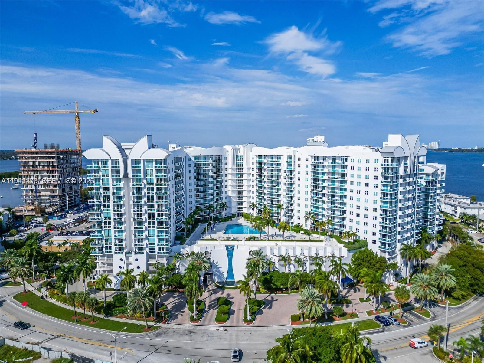 Spacious 2-bedroom residence with stunning views at 360 Condominium in North Bay Village. Features  open kitchen with brand-new refrigerator, oven, and microwave. Large balcony, floor-to-ceiling impact windows, and abundant natural light throughout. Primary suite includes walk-in closet and spa-style bath with jacuzzi and separate shower. Includes 2 assigned parking spaces. Resort-style, gated community with two pools, jacuzzi, valet, 24-hour concierge, fitness center, sauna, clubhouse, EV charging, marina, and water-sport storage. Minutes to beaches, highways, dining, and shopping.