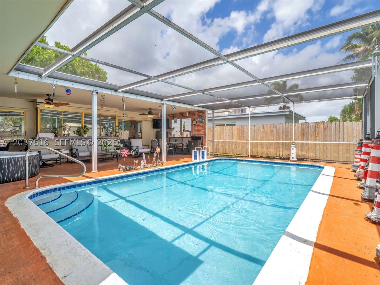 Want space? You got it, almost 2,880 SF of it. No HOA. X Flood Zone. Move-In Ready. Two Primary Suites. Multiple Living Experiences. Tucked into Hollywood Hills, this architecturally distinctive 4/3 plus home office, pool residence was designed not just to be lived in, but to be experienced and loved. Real hardwood floors throughout. The front bay window is custom-made, double-panel vacuum-sealed hi-impact glass with intricate etched glass detail providing shade and privacy. S-tile roof (2016-17). Screened pool and patio, because...South Florida and mosquitoes. Open floor plan. Flexible spaces. Private & completely fenced in. PVC plumbing. No cast iron pipes. Safe, family-oriented Hollywood Hills. Top-rated schools minutes away, including Chaminade-Madonna, Nativity and The Jewish Academy. Near Joe DiMaggio Children's Hospital and Memorial Regional, perfect for medical professionals. Electric vehicle charger? Install anytime, no HOA, no restrictions. Beach? Within just a few minutes of Hollywood Beach and Broadwalk, and a short distance to dining, shopping and entertainment, Dania Pointe, Fort Lauderdale-Hollywood International Airport, Port Everglades, Hard Rock Hotel and Casino, Aventura Mall, Tri-Rail and all major roads. Warning: Buyers who walk through stop comparing. They start figuring out how fast they can make it theirs. Multi-gen living, Airbnb, or simply yours. And yes. There is room for the dog. And the cat. And your sanity.