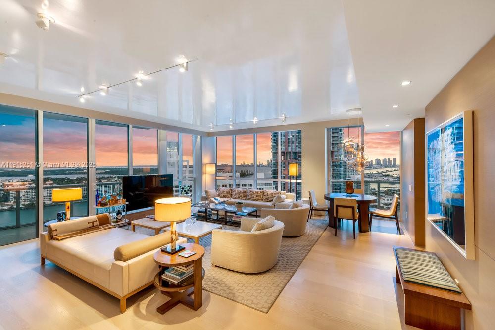 Beautifully renovated residence at Continuum South Beach embodies the essence of coastal sophistication, offering 2,300SF of refined interiors complemented by 938SF of expansive terraces designed for seamless indoor–outdoor living. From its high-floor vantage, the residence showcases sweeping ocean & city skyline vistas, a breathtaking backdrop for both entertaining & relaxation. Inside, light oak flooring, custom millwork & bespoke doors set a warm, contemporary tone, while fully renovated bathrooms & closets reflect meticulous attention to detail. Curated furnishings by Holly Hunt complete the residence with effortless elegance, creating a serene retreat that perfectly balances modern design and timeless coastal comfort within one of South Beach’s most coveted oceanfront addresses.
