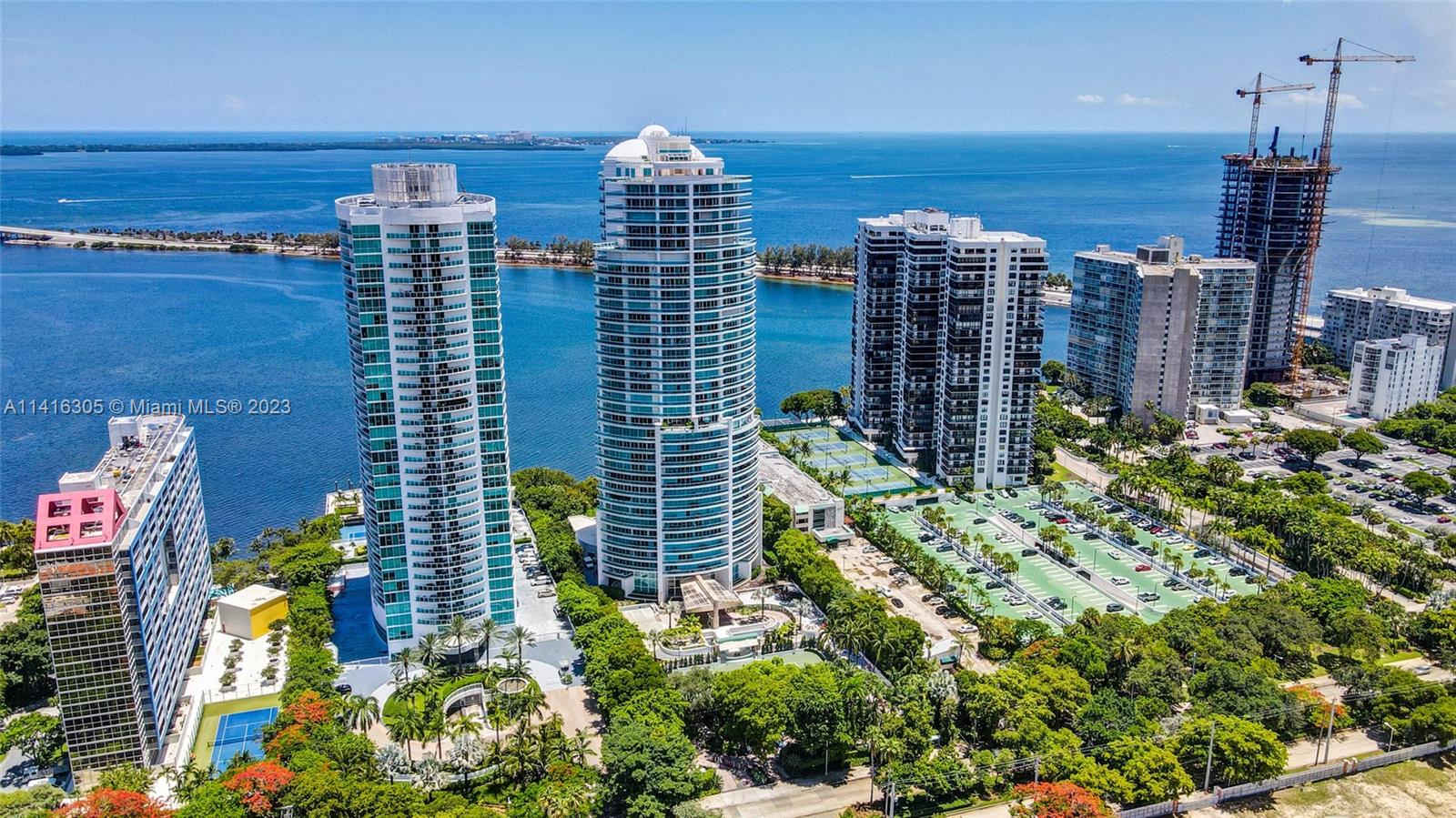 Located in Ugo Colombo’s prestigious Bristol Tower this one-of-a-kind unit showcases expansive living spaces, approximately 1760 square feet of outdoor living, and floor-to-ceiling windows with sensational views of Biscayne Bay and Miami. This home is complete with five bedrooms featuring en suite bathrooms, a kitchen with premier appliances, an ample wine cellar, two wet bars, electric hurricane shutters, smart home technology, and private elevator entrance to your foyer. Spanning approximately 5890 square feet, this truly is a home in the sky with all the amenities of a luxury building. The building hosts 24-hour security and concierge, valet parking, electric car charging stations, fitness center, sauna, temperature-controlled swimming pool, tennis court, and clubroom.