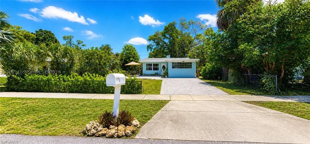 Seller is offering a $10,000 contribution toward buyer’s closing costs—an incredible opportunity for first-time buyers or anyone looking for a turnkey home in a sought-after area. OWNER MOTIVATED! Fully renovated cottage in the desirable Palm Lee Park area of Fort Myers! Public records reflect a 2BR/1BA, but the home features a spacious den room currently used as a 3rd bedroom, offering added flexibility for buyers. This home is truly move-in ready—recently painted inside and out, with a beautifully updated kitchen including new countertops and cabinets. Additional upgrades include a tankless water heater for energy efficiency and convenience. Enjoy an extended outdoor living space with newly installed pavers. Located in the heart of the McGregor Historic District, this property offers a prime location close to schools, parks, shopping, and dining. Important highlights: NOT located in a flood zone, no history of hurricane damage, and NO HOA restrictions. Showings by appointment—this one will not last!