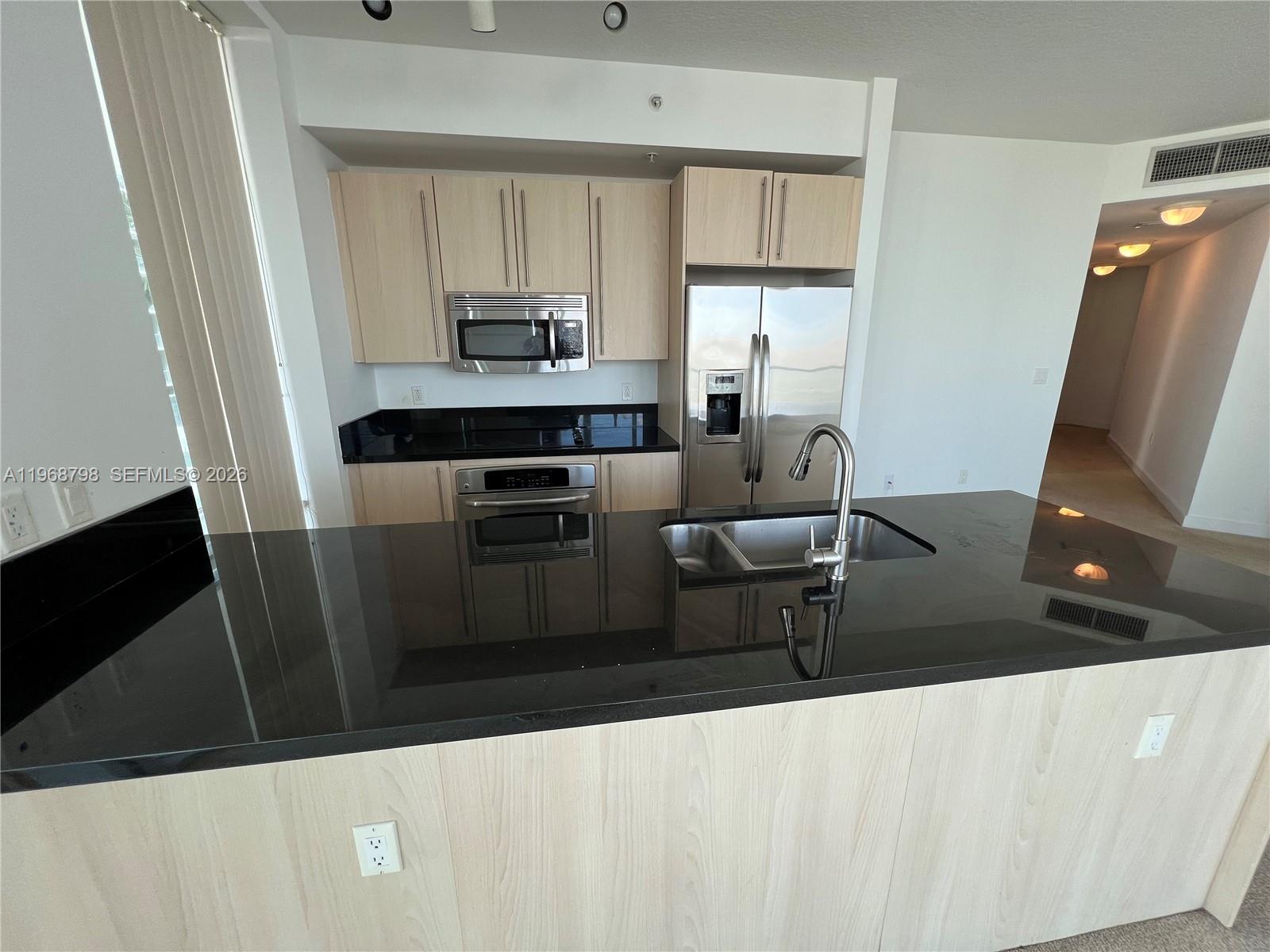 THE AXIS ON BRICKELL COND - Residential Lease