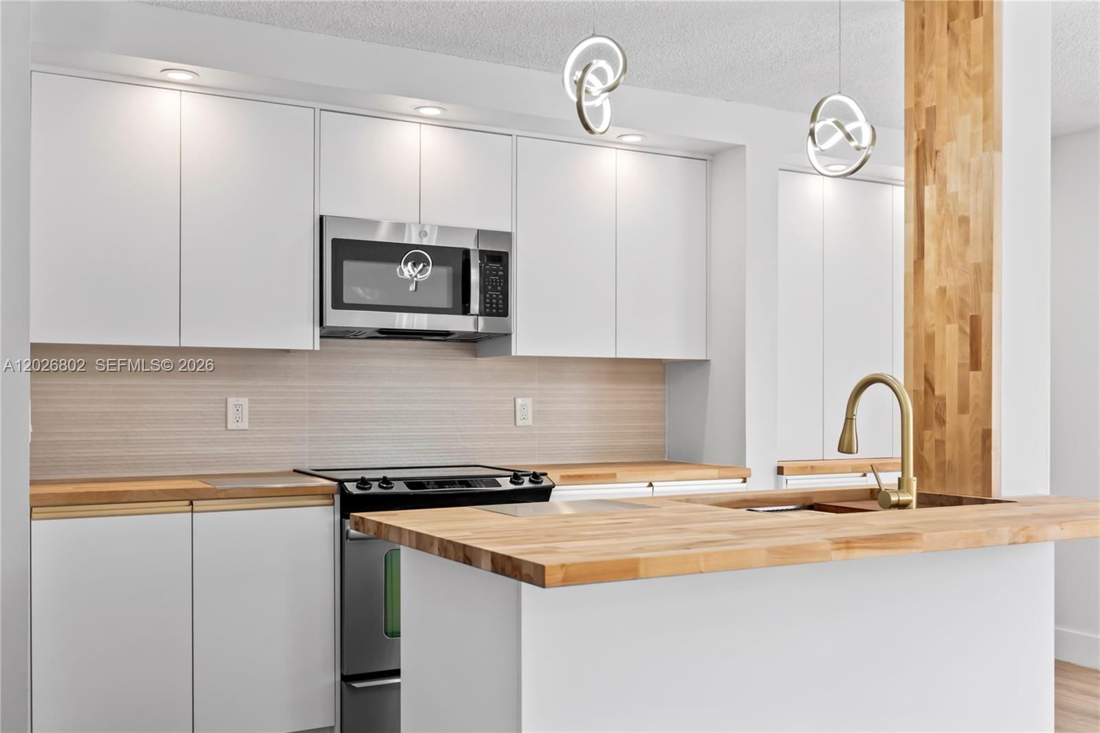 Discover this fully renovated 2-bedroom, 2-bath residence offering true turn-key living in a desirable 55+
community. Completed in 2026 and never lived in since, buyers will be the first to enjoy every brand-new
upgrade. Designed for comfort and style, the open-concept kitchen flows seamlessly into the living area and
showcases brand-new appliances and beautiful wood countertops. Laminated flooring runs throughout, paired with
elegantly finished walls and abundant natural light that creates a bright, welcoming atmosphere. The bathrooms
have been tastefully modernized, and generous walk-in closets provide ample storage space. Enjoy your private
screened balcony with a direct pool view