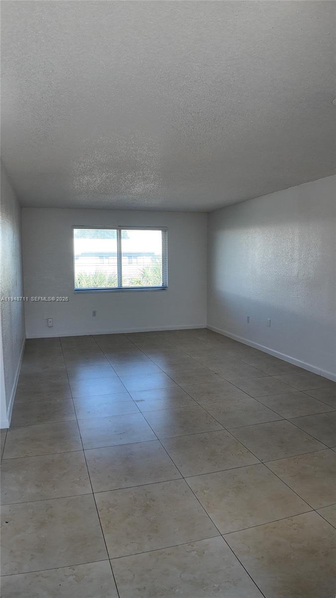 Spacious and well-maintained 1-bedroom, 1-bathroom apartment located on the 4th floor with elevator access, offering beautiful pool views in a secure, gated community with 24-hour security. This bright and comfortable unit features a very spacious layout. Rent includes water and high-speed Internet/Wi-Fi. The apartment comes with two unassigned parking permits and access to a community pool and on-site laundry facilities. Conveniently located near Florida Turnpike Exits 12 and 13. Fast and easy approval process. Excellent conditions and great value.