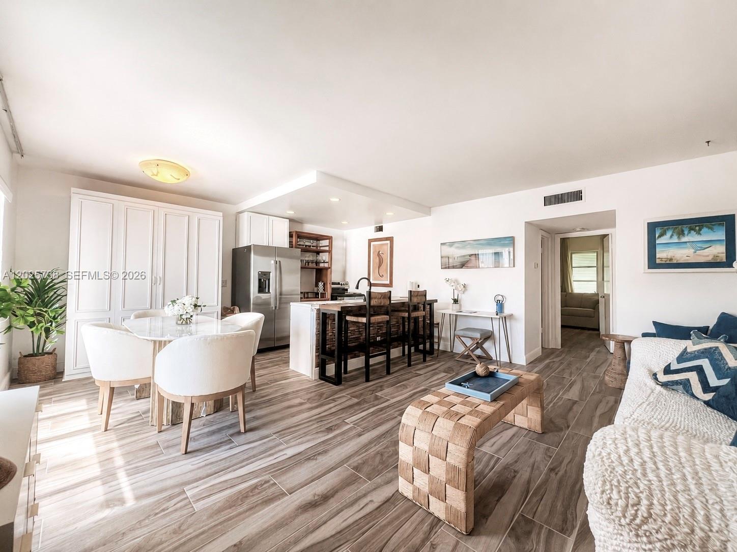 A must see!!! This cozy, calm, beautifully renovated, 1 bedroom condo, on the 1st floor, has an open concept floor plan, and is located in sought after South Palm Beach. Enjoy this MOVE IN READY, immaculately maintained unit, with beach access right across A1A. There is a heated pool by the Intracoastal Waterway to relax, by, with restaurants, shopping, a grocery store, and the 5-star resort & spa, Eau Palm Beach, just a short distance away. 1 pet under 26lbs allowed. Don't miss out on one of the lowest priced condos in South Palm Beach! Schedule your showing today!