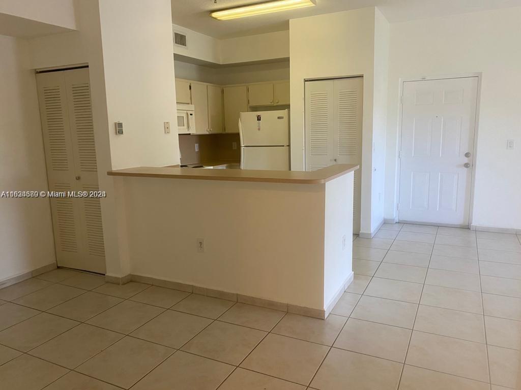 PALM GARDENS AT DORAL CON - Residential Lease