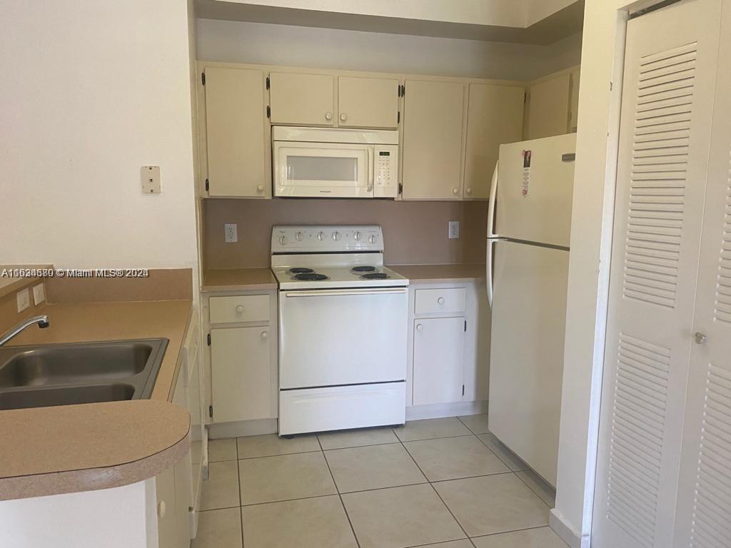 PALM GARDENS AT DORAL CON - Residential Lease