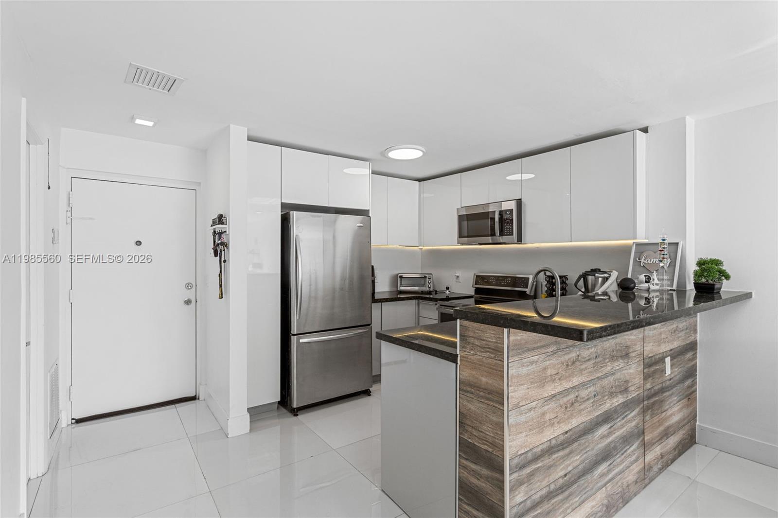 Located in the heart of the city, this bright and inviting 2-bedroom, 1-1/2 bathroom condo offers the perfect blend of coastal relaxation and urban convenience.

The interior features a thoughtful layout designed to maximize space and natural light. Residents will enjoy the convenience of being just steps away from the pristine sands of the Atlantic Ocean, as well as a variety of local dining, shopping, and entertainment options.

The building provides essential amenities to ensure a comfortable living experience, making it an ideal choice for a primary residence, a seasonal getaway, or a savvy investment opportunity in one of South Florida's most desirable zip codes. Whether you are looking to enjoy a morning walk on the beach or explore the vibrant nightlife of nearby South Beach and Bal Harbour, this location puts the best of Miami Beach at your front door. Prime Location: Directly on Collins Avenue with immediate beach access.

Vibrant Neighborhood: Close proximity to North Shore Open Space Park, restaurants, and retail.

Investment Potential: Located in a high-demand rental and resale area.
