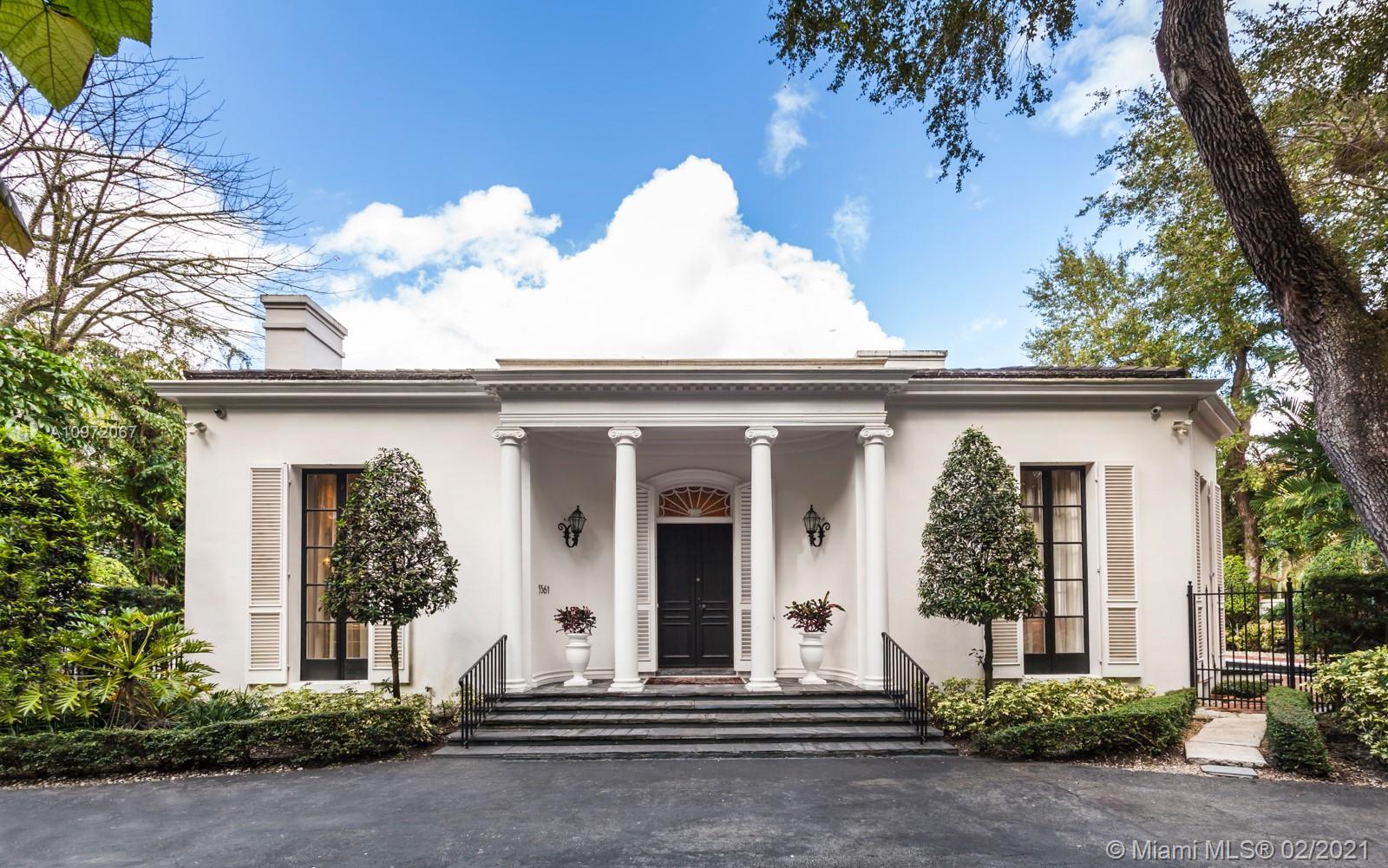 Built in 1931 and completely remodeled in 2012, "Estate Botanica" is a 6,552 Sq. Ft. Italian Provincial estate with a gated entrance and framed by distinguished pillars. This beautiful home features coffered ceilings and elaborate moldings. Adjacent to the classic foyer entrance there is a formal living and dining room, and the chef’s kitchen includes custom finishes, high-end appliances and granite countertops. The elegant main suite includes 2 separate baths, 2 walk-in closets with built-ins, and seating area. Enjoy absolute privacy among a peaceful garden and trees with an alfresco dining patio area. There also is a pool with a charming pavilion and guest house. Easy walk to center Grove, restaurants, schools and worship establishments. Estate Botanica is truly a remarkable home.