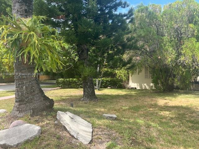 Corner Property in Miami Beach with an oversized lot 11,724 sf. Cozy and quiet House surrounded by trees.
The Pool was filled in by previous owners.
The property next Door also for sale 
Combining the two lots makes a total of over 22,000 SQ F