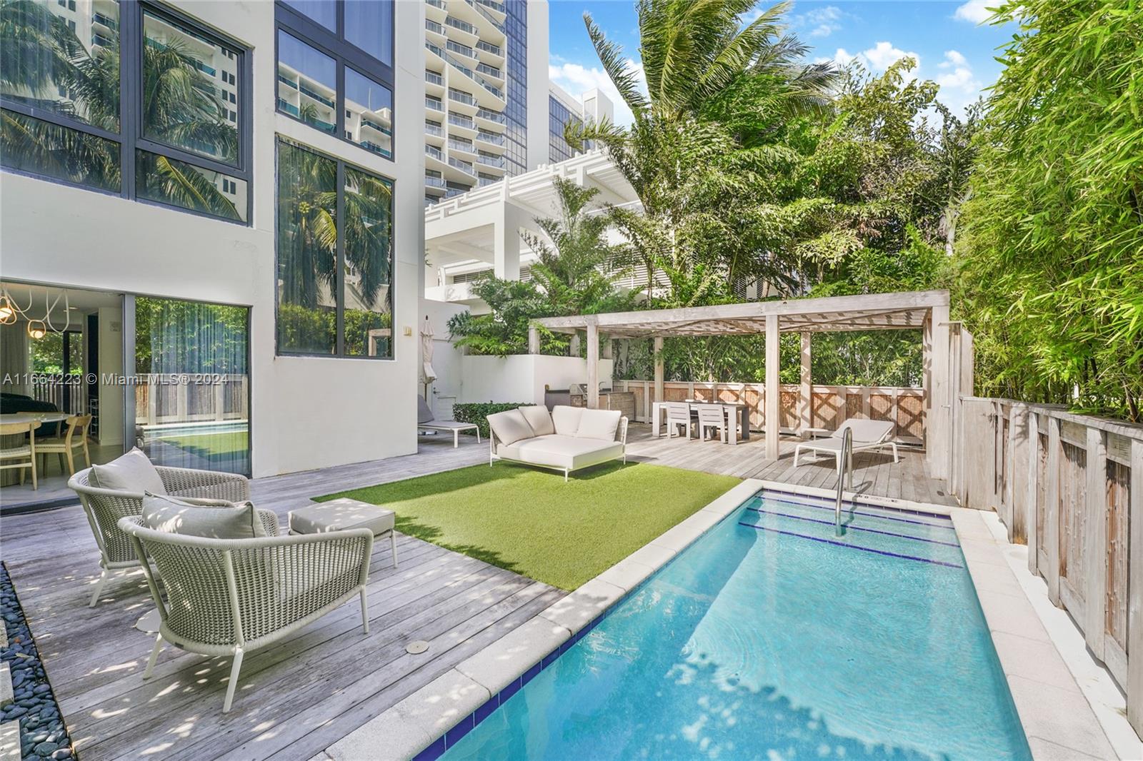 Welcome to Bungalow One nestled in the heart of Miami Beach at the W Hotel! This exquisite home offers the perfect blend of modern luxury and serene natural beauty. With not one, but two private pools, a rooftop paradise, and impeccable interior design, this property is the epitome of Miami living. Dive into your own personal aquatic haven or host unforgettable soirées on your rooftop
terrace at this One-of-a-Kind Residence. The Bungalow have been recently redesigned, comes fully furnished and is part of the hotel rental program. Easy to visit do not hesitate to ask for the 3D virtual tour link