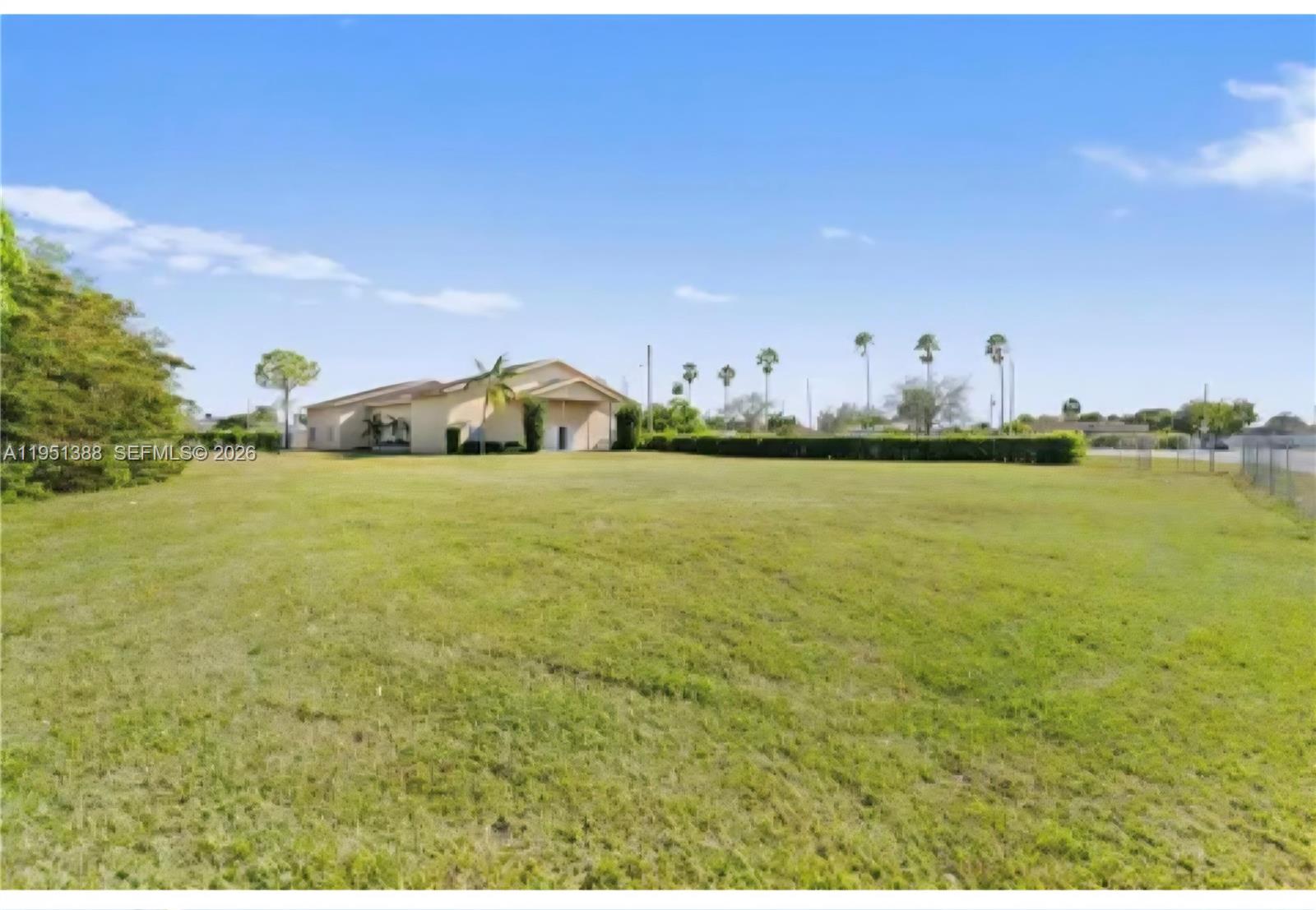 Prime South Dade Development Opportunity with Live Local Upside! Rare opportunity to acquire an under-constructed +/-6,800 SF structure on a combined 42,300 SF corner lot in Goulds. The property includes four folios (30-6, 0230, 0260, 0270) joined by a Unity of Title, offering flexibility for redevelopment or adaptive reuse. The unfinished place of worship requires completion and issuance of a Certificate of Use (CU). Upon obtaining the CU, a buyer may pursue redevelopment under Florida's Live Local Act (SB 1730), subject to county approval, including potential 200-unit multifamily development with affordable housing incentives. Faith-based organizations may complete the structure for worship use with future expansion into a school or faith-based affordable housing campus. Alternatively, a buyer may seek a Unity of Title release and develop single-family homes, as zoned RU-1. Ideally located at the corner of SW 216 St & SW 110 Ave, the site offers strong visibility, traffic exposure, and proximity to the new South Dade Transit Busway (3 minutes). The property is also just 4 minutes from the $1.5B Southplace City Center redevelopment at Southland Mall, positioning it for long-term growth. Well-suited for developers, religious organizations, educational institutions or investors seeking long term growth.