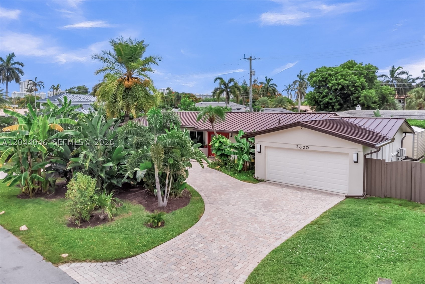 Beautifully renovated smart home in the desirable Coral Ridge Country Club neighborhood. Originally renovated as a forever home, no expense was spared in creating a residence that blends luxury, comfort, and modern convenience. Due to a change in life plans, the next owner now has the rare opportunity to enjoy a truly turnkey home with high-end upgrades throughout.
The beautifully designed gourmet kitchen features premium natural stone countertops and opens seamlessly to the spacious living and dining areas, creating the perfect space for everyday living and entertaining. Elegant porcelain flooring runs throughout the entire home, enhancing its modern and cohesive design. The home also offers four spacious bedrooms with generous closets, smart-home technology, smart exterior lighting, security cameras, and indoor/outdoor speakers.
Enjoy peace of mind with a new 2026 roof, all-new electrical and plumbing systems, high-impact windows and doors, and a dedicated electrical panel connection for a portable generator.
The climate-controlled two-car garage/man cave includes A/C, epoxy flooring, smart lighting, speakers, and an EV charger. A large storage shed provides plenty of room for tools, bikes, and equipment, keeping the garage organized and clutter-free.
Just minutes from beaches, golf, dining, shopping, parks, top-rated schools, and fitness centers, this home offers the very best of the South Florida lifestyle.