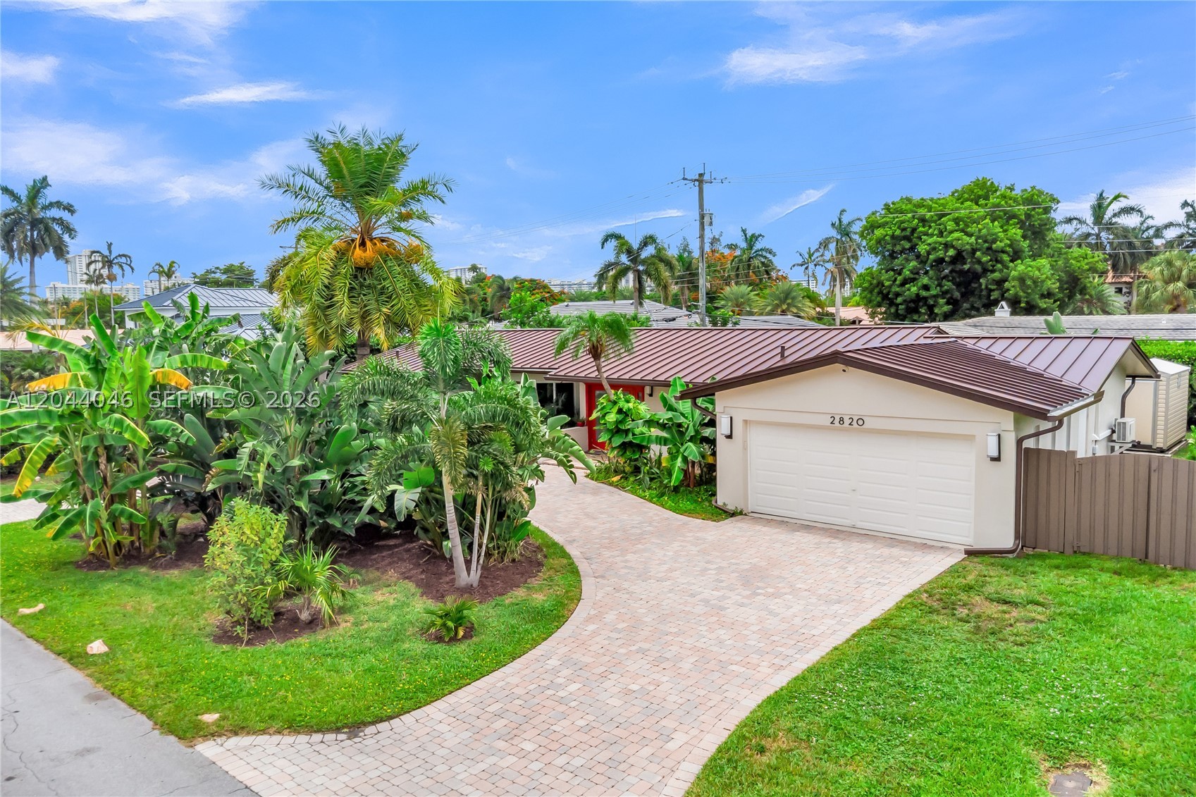 Beautifully renovated smart home in the desirable Coral Ridge Country Club neighborhood. Originally renovated as a forever home, no expense was spared in creating a residence that blends luxury, comfort, and modern convenience. Due to a change in life plans, the next owner now has the rare opportunity to enjoy a truly turnkey home with high-end upgrades throughout.
The beautifully designed gourmet kitchen features premium natural stone countertops and opens seamlessly to the spacious living and dining areas, creating the perfect space for everyday living and entertaining. Elegant porcelain flooring runs throughout the entire home, enhancing its modern and cohesive design. The home also offers four spacious bedrooms with generous closets, smart-home technology, smart exterior lighting, security cameras, and indoor/outdoor speakers.
Enjoy peace of mind with a new 2026 roof, all-new electrical and plumbing systems, high-impact windows and doors, and a dedicated electrical panel connection for a portable generator.
The climate-controlled two-car garage/man cave includes A/C, epoxy flooring, smart lighting, speakers, and an EV charger. A large storage shed provides plenty of room for tools, bikes, and equipment, keeping the garage organized and clutter-free.
Just minutes from beaches, golf, dining, shopping, parks, top-rated schools, and fitness centers, this home offers the very best of the South Florida lifestyle.