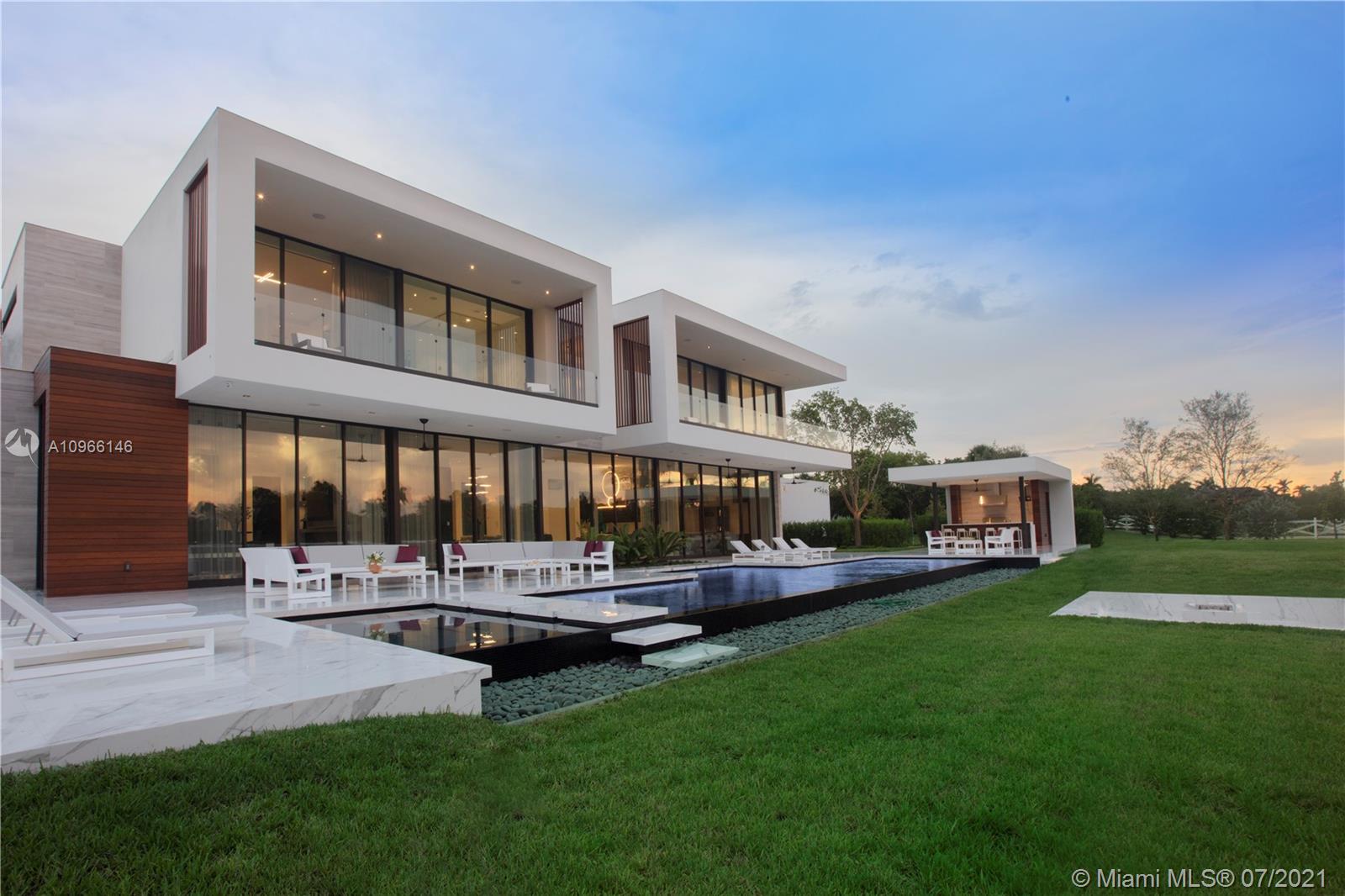!PRICE IMPROVEMENT! Never lived in modern estate nestled in the exclusive and only gated community of Landmark Ranches in Southwest Ranches, Fl. This one of a kind property was designed by the acclaimed architect firm of Choeff Levy Fischman. This masterpiece resides on 2.4 acres of privacy on a cul de sac. 
Featuring over 9,000 sf under air, over 10,000 sf total, 7 bedrooms, 9.2 baths. Floor to ceiling glass windows allows for the most spectacular sunset views and indoor & outdoor lifestyle living. 
No expenses spared: Home theater, Gym, Spa, Outdoor kitchen, Sunken fire pit, Half basketball court, Smart house, chef's Kitchen, Maid's quarter, and Elevator. Ready for fine living, come see this spectacular property!

SWR-Is located in the heart of Broward. Approx. 30mins from Mia/FLL
