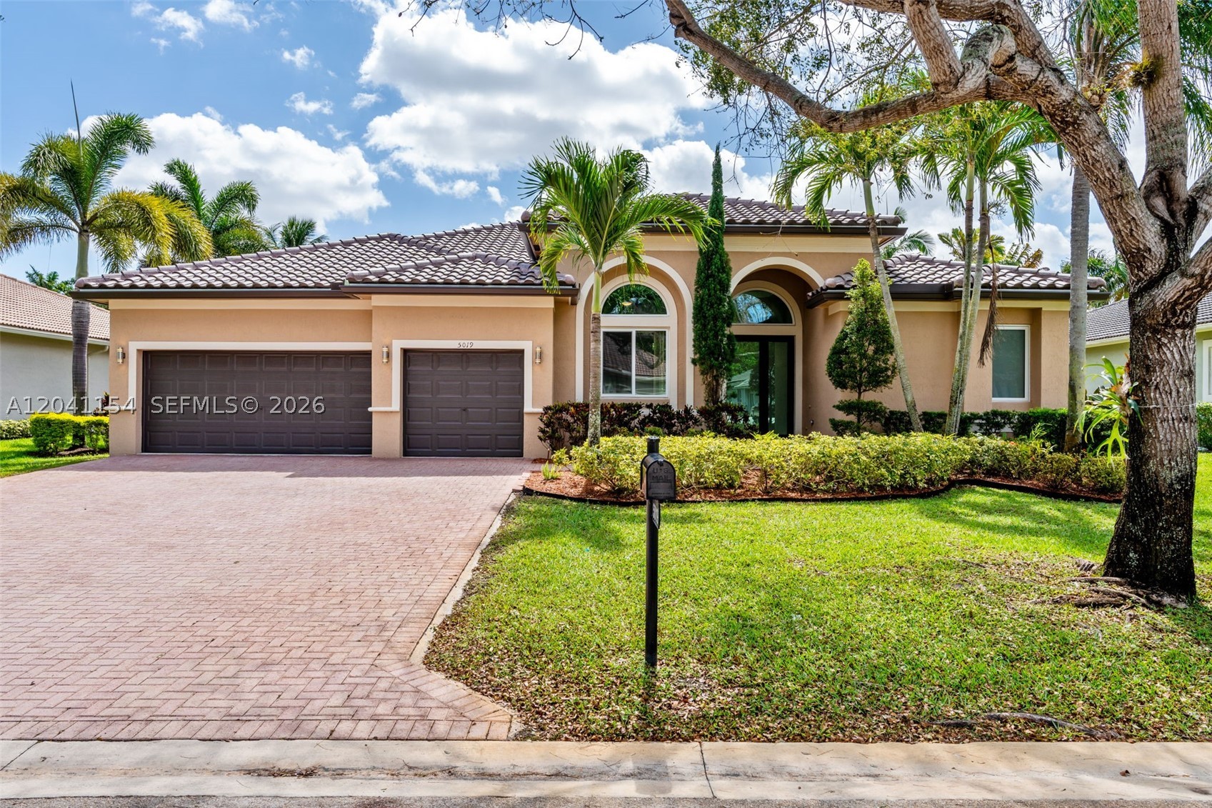 Welcome to Kensington Glen, where thoughtful design meets effortless South Florida living. From the moment you walk through the impact glass double doors, you’re greeted with soaring ceilings, natural light pouring in, and a direct line of sight to your private pool. This is the kind of home that feels open, calm and ready to be lived in. With a triple split floor plan, spacious primary suite and a flexible office that can easily serve as a fifth bedroom, every inch of this home was designed with both comfort and functionality in mind. The kitchen sits at the center of it all overlooking the main living spaces and built for connection, whether it’s a quiet morning or a full house on the weekend. Step outside and it only gets better. A fully fenced backyard, covered patio, and pool area create the perfect setting to unwind or entertain, with newly planted privacy hedges that will grow into your own secluded retreat. And the best part? The big-ticket items are already done. Brand new roof, impact windows and doors, solar and fresh interior and exterior paint, all completed in 2023. Located in one of Coral Springs’ most desirable communities with a low HOA, and just minutes from everything. This isn’t just a home you tour it’s one you feel the moment you walk in.