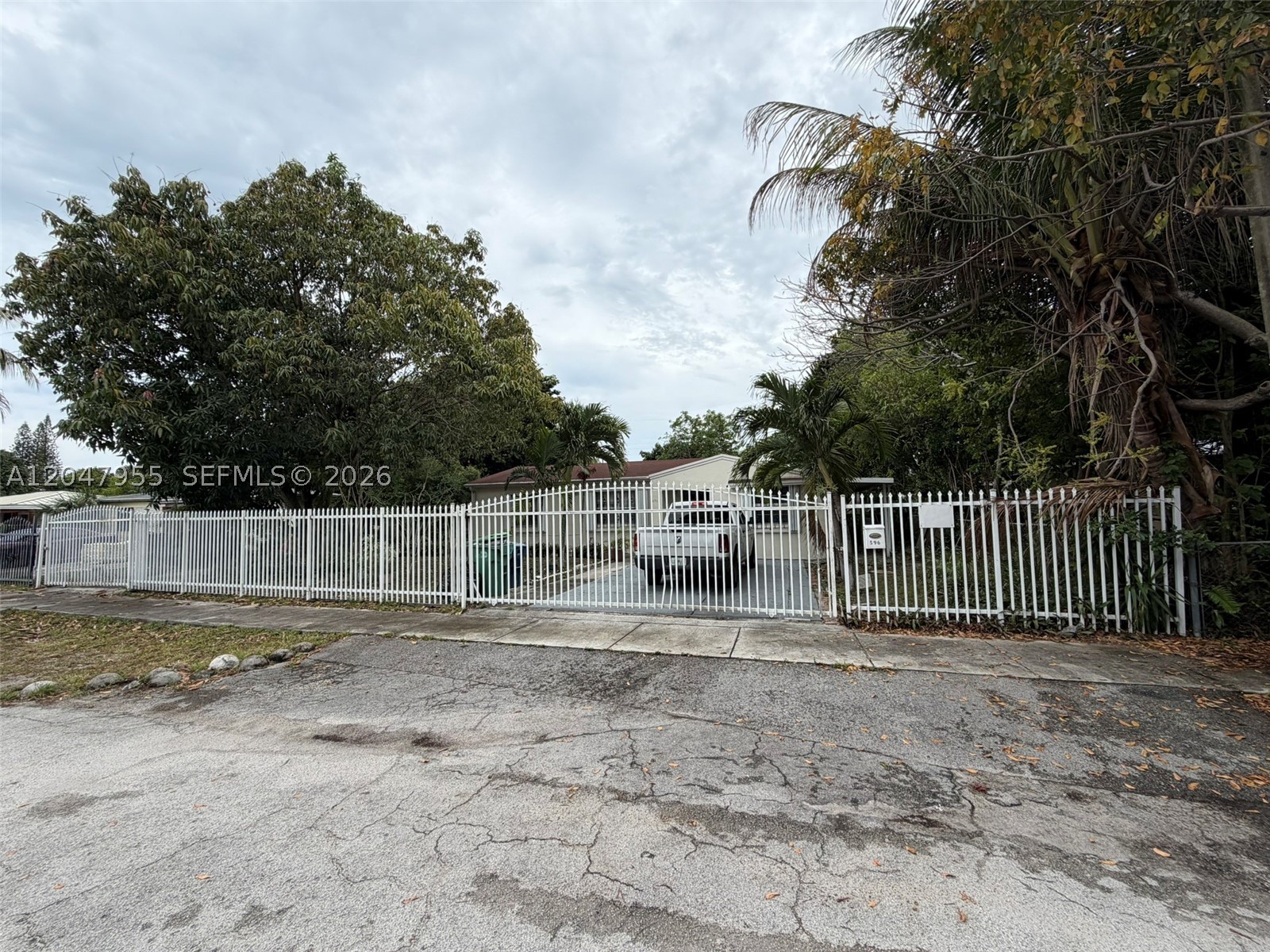 Large single-family home with a big patio and plenty of parking. 4 Bedrooms and 2 baths.