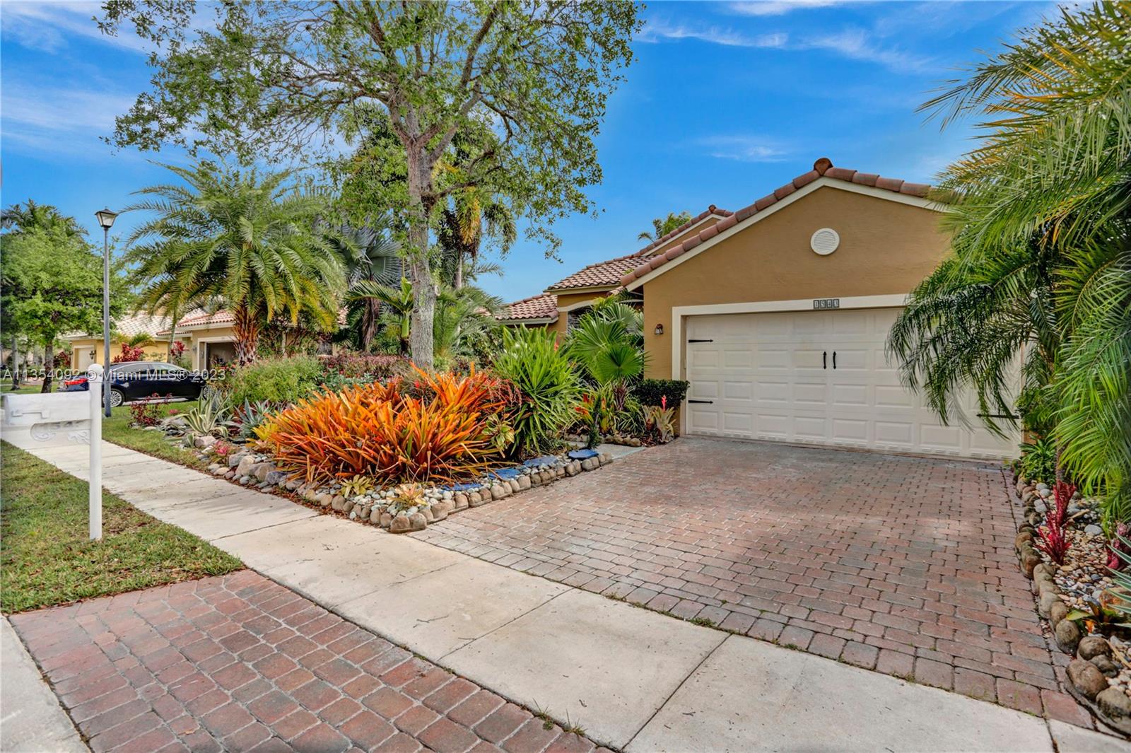 Tropical paradise with expansive lake view. Nestled in the serene gated community Encantada. Central location for commuting. Near schools, parks, shopping and more! 

Spectacular 4/2 home reminiscent of Old World charm. A castle you can call home. Complete with marble entry, breathtaking crystal chandeliers, artfully accented with mosaic pieces. This home has a spacious living room and dining area. Lots of palm trees & exotic foliage. The master has two walk in closets and a spa bathroom with egg shaped tub. Separate shower with frameless doors. Two vanities with sitting areas in the bath with decorative mirrors and lighting.  Kitchen features include 42" wood cabinets, granite counter tops and newer appliances. Separate office area with bookshelves. Impact windows. Showings Start 3/20.