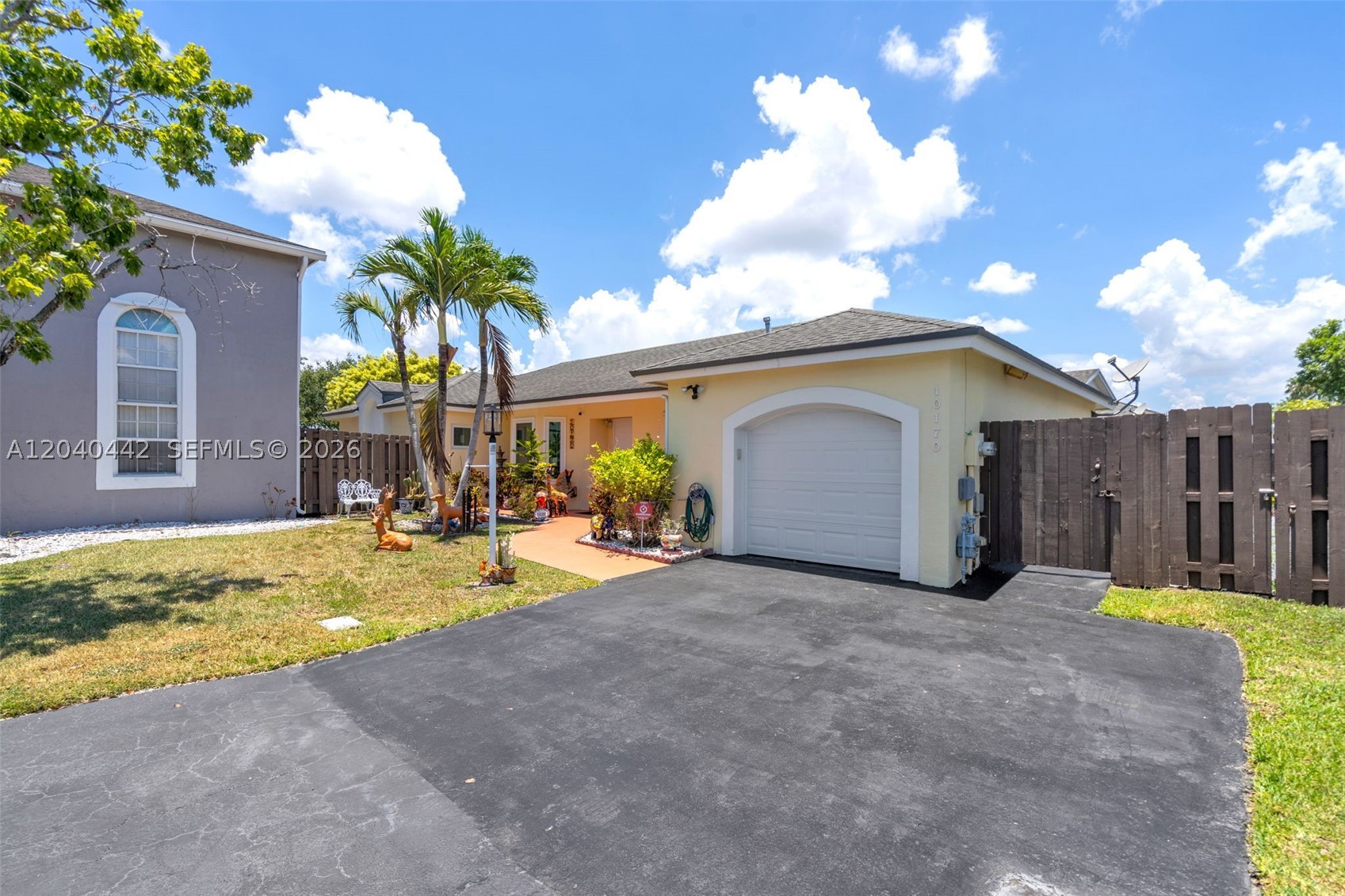 Doral Pines — beautiful 3BR / 2 BA single-family home in a gated community with 24-hour security. Upgrades include a renovated kitchen with KitchenAid appliances, hurrican impact windows, marble flooring in common areas & baths, and hardwood floors in bedrooms. Spacious master suite with walk-in closets. Home features a fenced patio, abundant natural light, and utility/convenience upgrades. Residents enjoy Doral Park Country Club amenities. Easy access to major highways, shopping, and dining.
Private outdoor spaces perfect for entertaining, gardening, or relaxing in total privacy. Ideally located near shopping, dining, schools and major roadways, this home offers convenient everyday living with a peaceful
 neighborhood feel. Ideal as a primary residence, starter home, or investment — pet-friendly community with gated 24/7 security and community pool. Includes membership to Doral Park Country Club with resort-style clubhouse, state-of-the-art gym, sauna, pool, pickleball & tennis courts, playground and more.
SELLER WILL PAY OFF THE PACE TAXES AT CLOSING