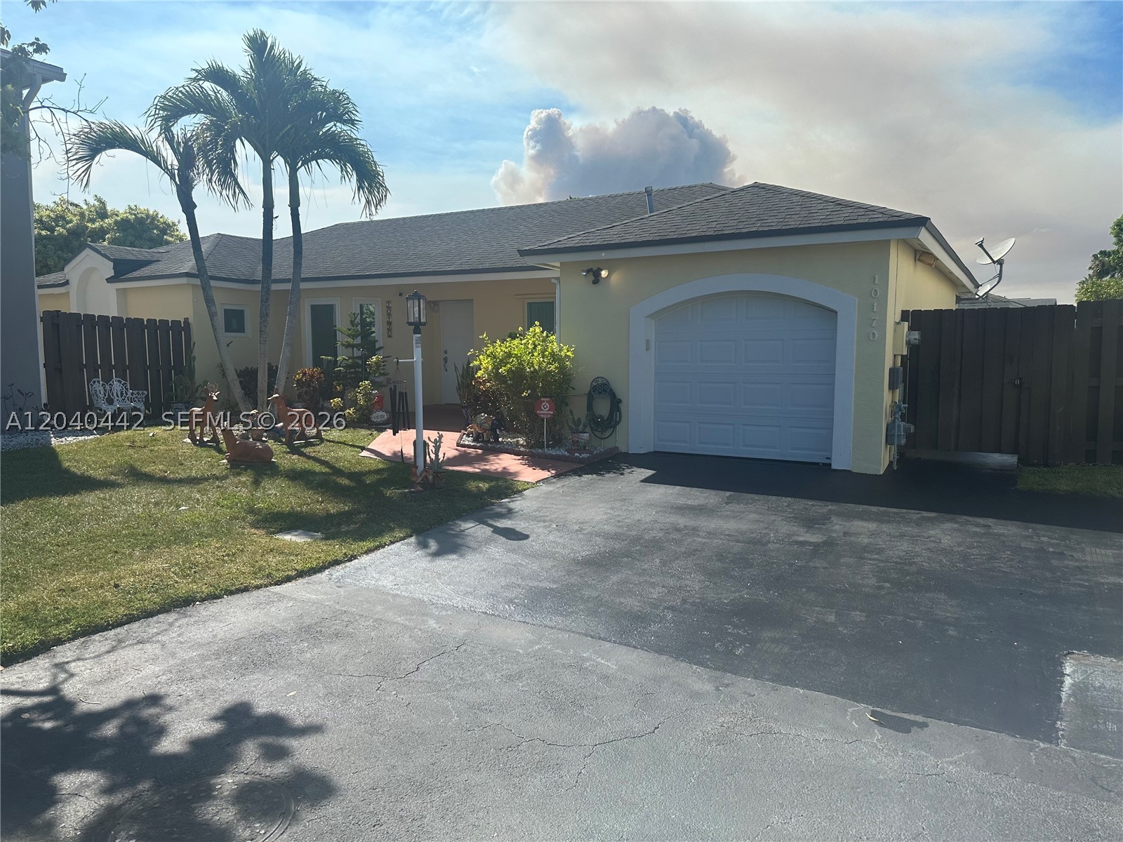 Doral Pines — beautiful BR / 2 BA single-family home in a gated community with 24-hour security. Upgrades include a renovated kitchen with KitchenAid appliances, hurrican impact windows, marble flooring in common areas & baths, and hardwood floors in bedrooms. Spacious master suite with walk-in closets. Home features a fenced patio, abundant natural light, and utility/convenience upgrades. Residents enjoy Doral Park Country Club amenities. Easy access to major highways, shopping, and dining.
Private outdoor spaces perfect for entertaining, gardening, or relaxing in total privacy. Ideally located near shopping, dining, schools and major roadways, this home offers convenient everyday living with a peaceful
 neighborhood feel. Ideal as a primary residence, starter home, or investment — pet-friendly community with gated 24/7 security and community pool. Includes membership to Doral Park Country Club with resort-style clubhouse, state-of-the-art gym, sauna, pool, pickleball & tennis courts, playground and more.
SELLER WILL PAY OFF THE PACE TAXES AT CLOSING
