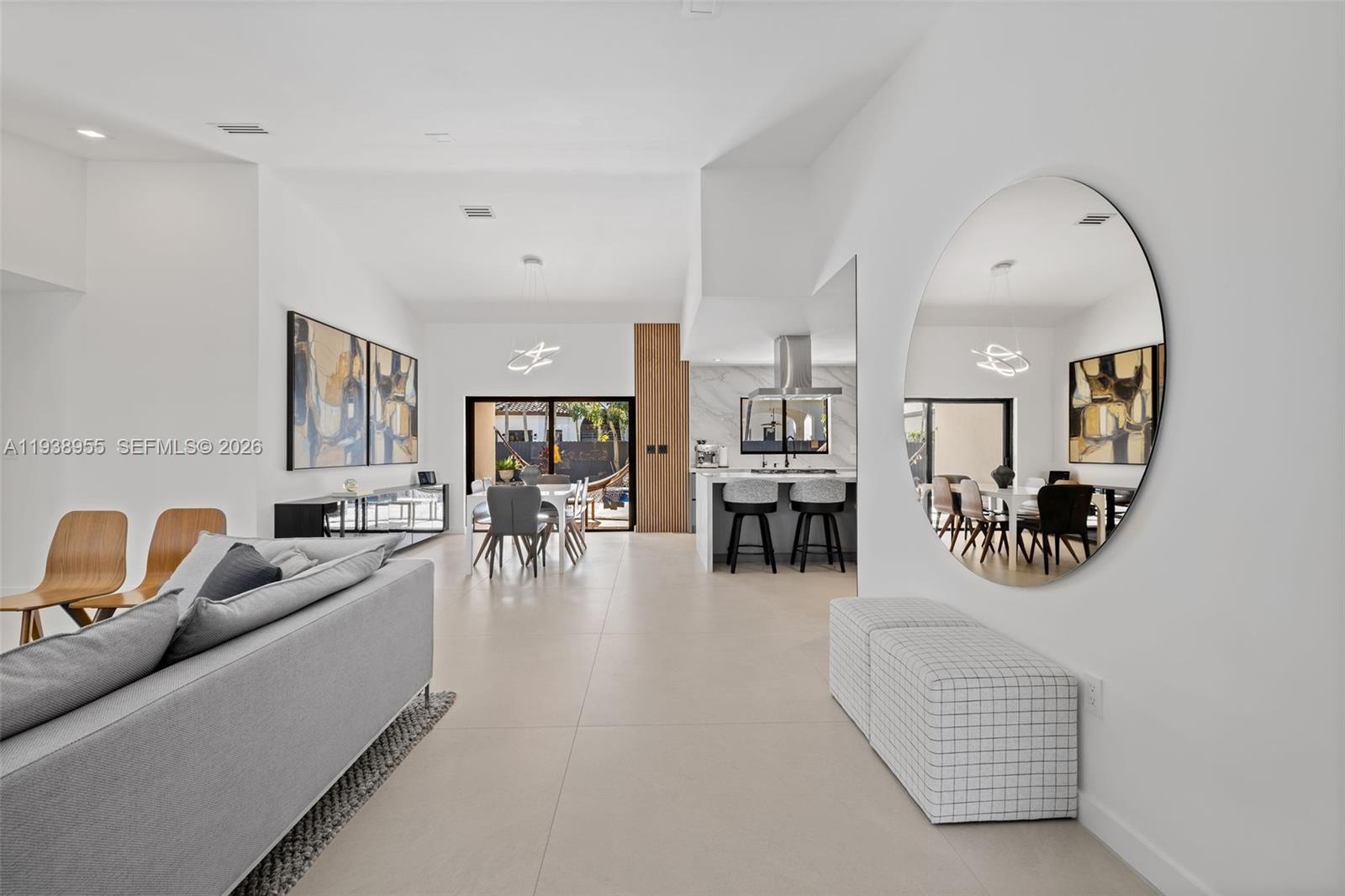 Discover the exceptional lifestyle in the highly sought-after Royal Oaks Community—a premier neighborhood with top-rated schools, serene tree-lined streets, and a genuine family atmosphere.

This stunning fully renovated residence features an adjusted square footage of 2316 feet, open-concept design with living, dining, and cooking areas. The custom kitchen includes sleek slated panels, a concealed coffee bar, and premium Bosch appliances, including a gas cooktop.

Large-format 48x48 porcelain tiles flow throughout, and expansive Hurricane-impact windows flood the spaces with natural light and frame picturesque views. Every bedroom offers expansive closet space, and the home office provides bright views of the backyard and sparkling pool.

Additional highlights include Hurricane-impact windows and doors, a large 2-car garage, a renewed saltwater pool with a new motor and Smart electric bidet toilets in all bathrooms for that modern convenience.

This home delivers comfort, style, and practicality in equal measure, making it a true showpiece of contemporary luxury. Schedule a private tour today and envision the life you’ve been dreaming of in Royal Oaks!