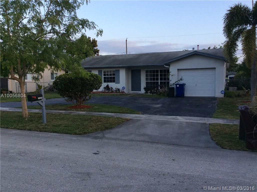 Location, Location close to Sawgrass Mills and Sawgrass Express Way. This 3 bedroom 2 bath home with high ceiling in living/dining room, 1 car garage, enclosed patio, with fruit trees, fenced back yard. Tiled in living room, wood in master bedroom and carpet in the other bedrooms.