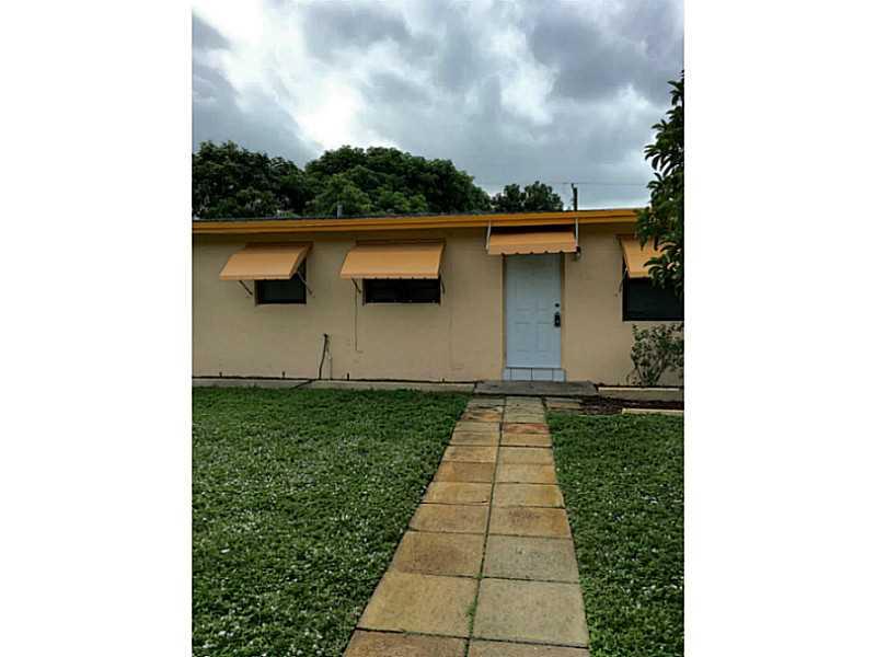 Enjoy the cool fall breeze on the porch of this well maintained Fort Lauderdale home! Enjoy the luxury of a fenced yard, perfect for family gatherings and BBQ's. Shaded by mango and avocado trees, this home comes equipped with a full size washer and dryer , and a beautiful den off the kitchen. Don't let this gem slip away.