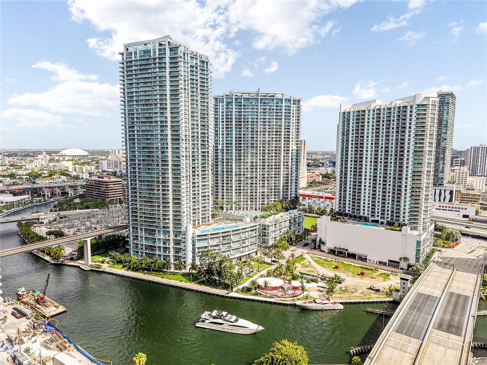 Located in the heart of Miami, this residence offers a refined balance of comfort and city living. 
This 1-bedroom, 1.5-bath residence at The Ivy at Riverfront presents a bright and airy feel with beautiful south-facing views, capturing the Miami River and the evolving Brickell skyline. Floor-to-ceiling windows fill the space with natural light, enhancing the open layout and creating a seamless indoor-outdoor experience. The unit features a spacious open-concept kitchen and living area, ideal for both everyday living and entertaining. The bedroom includes a built-in walk-in closet with custom built-ins, offering both functionality and generous storage.
Thoughtfully updated, the residence includes a new refrigerator, dishwasher, and in-unit full-size washer and dryer, along with updated sink fixtures.
The building has recently undergone lobby and hallway renovations, residents enjoy modernized access systems, including app-based entry and facial recognition technology.
The Ivy at Riverfront offers a full-service lifestyle with resort-style amenities, all within minutes of Brickell City Centre, dining, and Miami’s top destinations.
With 846 Sq.Ft. of thoughtfully designed living space, the residence offers a large primary bedroom with large ensuite bathroom and features a convenient powder room for guests. Offered in move in ready condition and available for showings, this is an excellent opportunity for both end users and investors.