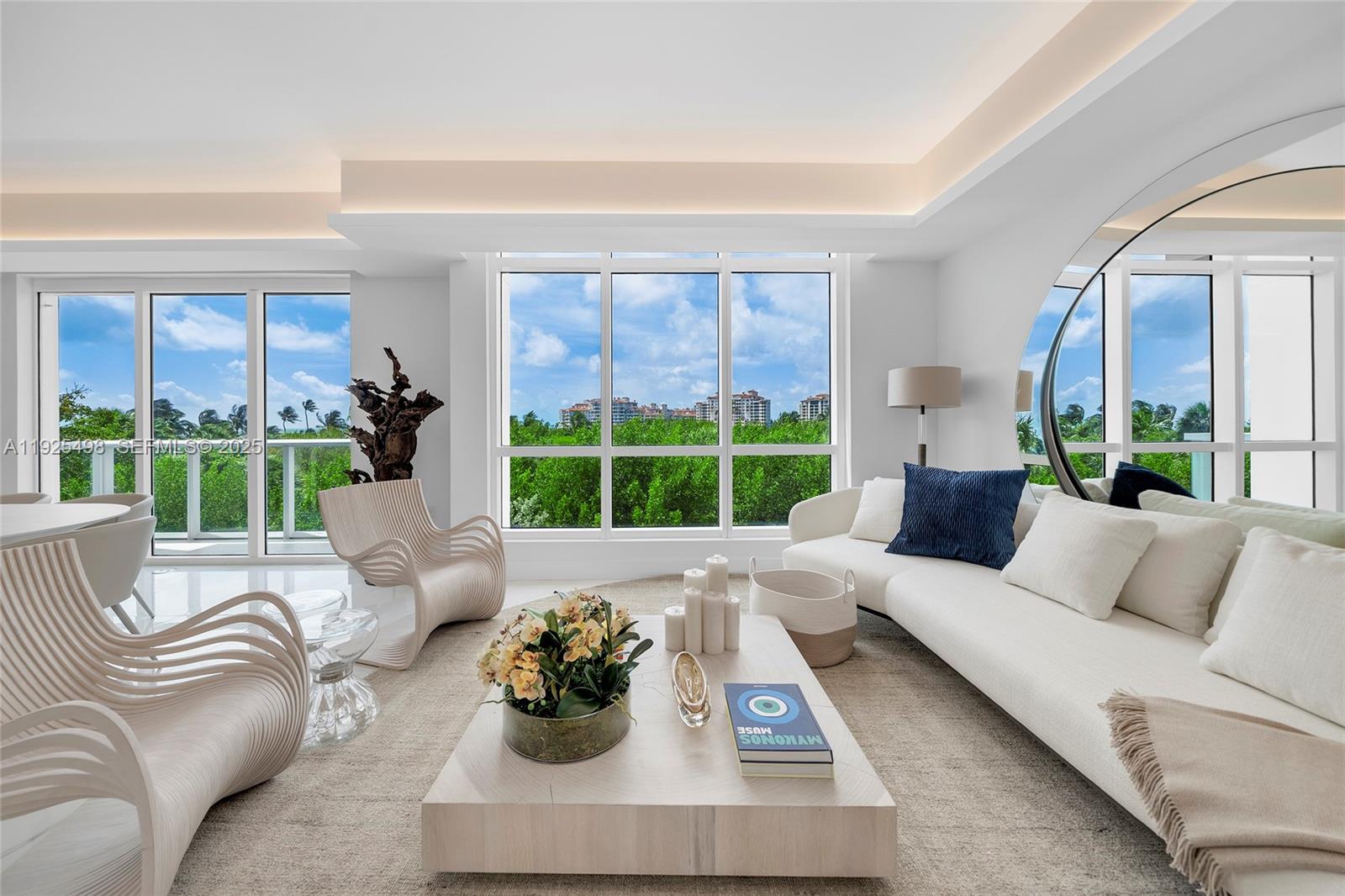 This brand-new redesigned townhouse boasts a spectacular layout w/4 levels of contemporary luxury at the Continuum. Enter via the 4th level greeted by spacious living & dining areas, access to a terrace w/partial ocean & city views, Spanish porcelain tile floors, custom millwork, & a sleek chef’s kitchen w/top-of-the-line Thermador WIFI accessed appliances. A modern metal/wood staircase leads down to a 3rd level w/a powder room & private principal suite w/direct terrace access, custom closet spaces & beautiful bathroom w/glass shower & spa tub. 2nd level offers 2 guest BRs w/en-suite bathrooms, access to a shared terrace. Ground floor with full laundry room w/Electrolux washer & dryer, access to outdoor common area & 2 private parking spaces in the garage. Artefacto furniture is avail.