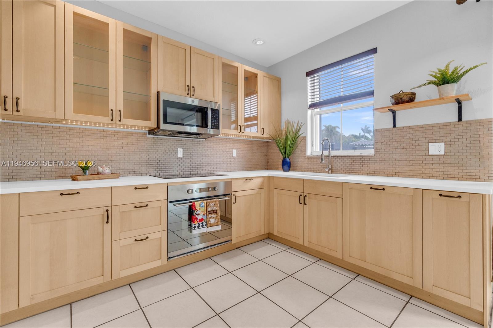 3/3 TOWNHOME in Doral with low HOA. Located in a prime area of Doral, this 3-bedroom, 3-full bathroom townhome offers convenience and comfort. One bedroom and a full bathroom are conveniently situated on the first floor. Each bedroom has its own private bathroom. Corner unit. Accordion shutters. One of the lowest HOAs in Doral, covers the roof, exterior, and common areas. This gated community is both secure and well-maintained. Exteriors have been recently painted and roof replaced about two years ago. HOA has reserves. Owners can park up to 3 cars. Close to supermarkets, restaurants, and major expressways for quick and easy access. Schedule a showing today.