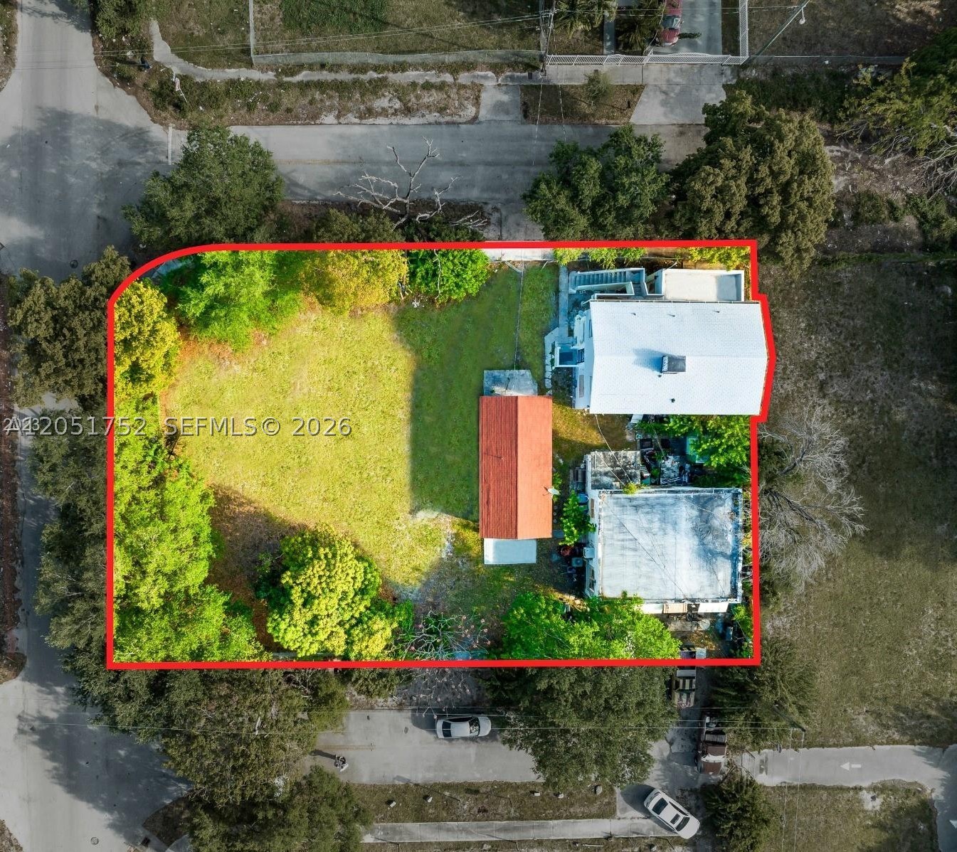 Prime multifamily investment and development opportunity in Miami’s rapidly evolving NW 79th Street Corridor! This unique corner property consists of 3 separate buildings with a total of 7 legal units, offering immediate income potential plus significant upside. The property includes a 3-bedroom/2-bath single-family home, a 1-bedroom/1-bath single-family home, and a 5-unit building with five 1-bedroom/1-bath apartments. In addition, the corner portion of the lot offers the potential to build a new duplex, expanding the property to a total of 9 units, subject to applicable approvals and permitting. Located near Liberty Square and within an Opportunity Zone, this property is ideally positioned to benefit from continued neighborhood investment, redevelopment, and growth. An excellent opportunity for an investor seeking a combination of existing multifamily income, value-add potential, and future development possibilities in an up-and-coming Miami location. Rare opportunity to acquire, reposition, and expand in one of Miami’s emerging investment corridors