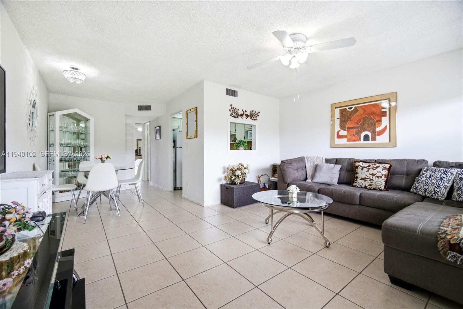 WELL-KEPT 1 BEDROOM, 1 BATHROOM CONDO LOCATED ON THE 2ND FLOOR IN THE DESIRABLE 55+ COMMUNITY OF SUNRISE LAKES PHASE 3. THIS UNIT FEATURES A BRIGHT, SPACIOUS LIVING AREA WITH NEUTRAL TILE FLOORING THROUGHOUT AND PLENTY OF NATURAL LIGHT. ENJOY RELAXING MORNINGS ON THE SCREENED-IN BALCONY OVERLOOKING PEACEFUL GREEN SPACE AND MANICURED GROUNDS. CLEAN AND MOVE-IN READY WITH AMPLE STORAGE AND A FUNCTIONAL LAYOUT.
COMMUNITY AMENITIES INCLUDE A CLUBHOUSE, 5 SWIMMING POOLS, FITNESS CENTER, TENNIS COURTS, SHUFFLEBOARD, PICKLEBALL,  BILLIARDS, LIBRARY, COURTESY BUS, AND AN ACTIVE SOCIAL CALENDAR. CONVENIENTLY LOCATED NEAR SHOPPING, DINING, MEDICAL FACILITIES, AND MAJOR ROADWAYS. QUIET, WELL-MAINTAINED COMMUNITY.
