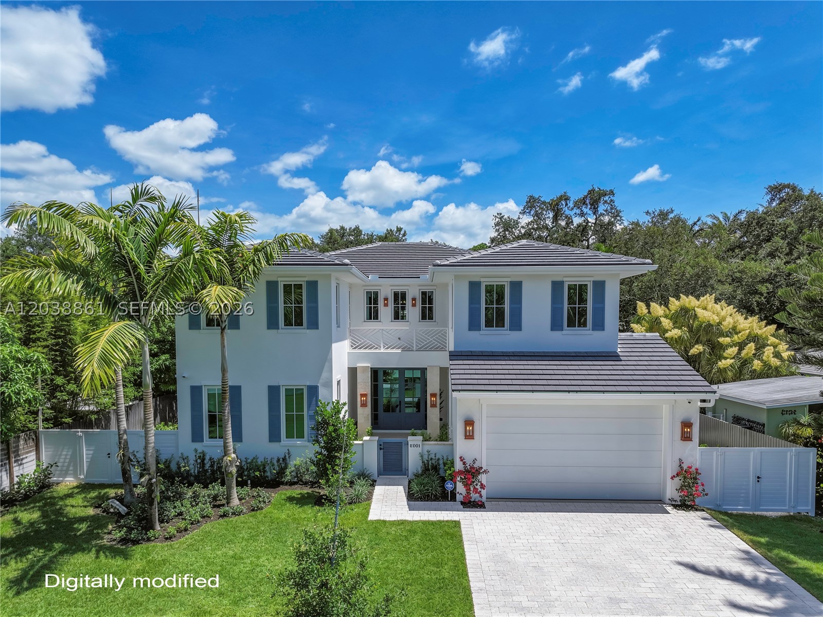 This majestic new construction from Castillo Architecture has been finished to the highest standards of interior design by Cozy Salazar Interiors. This 5 bedrooms, 5 en-suite bathrooms residence is located in the heart of South Miami, nestled in the secluded neighborhood of Mango Terrace. The stunning open floor plan offers a nice indoor-outdoor flow. Large kitchen with extra large island, panel ready Thermador appliances, chef’s range with 6 burners + griddle and pot filler, gorgeous farmhouse sink overlooking the backyard and thoughtfully incorporated high end accent lighting throughout. The large family area is accentuated with a fully equipped custom built in bar. Double doors open to a beautiful covered terrace with limestone floor & privacy wall, built in grill and designer’s landscaping throughout.The second floor offers a second living room with a custom refreshment area with cooling drawers and counter for your morning coffee or afternoon snacks. Double doors open to the large master bedroom with fully built in walk-in closet, beautifully designed master bathroom with double separate vanity and an extra large balcony. Additional features include aesthetically designed double laundry rooms, conveniently located one in each floor. Two car garage.