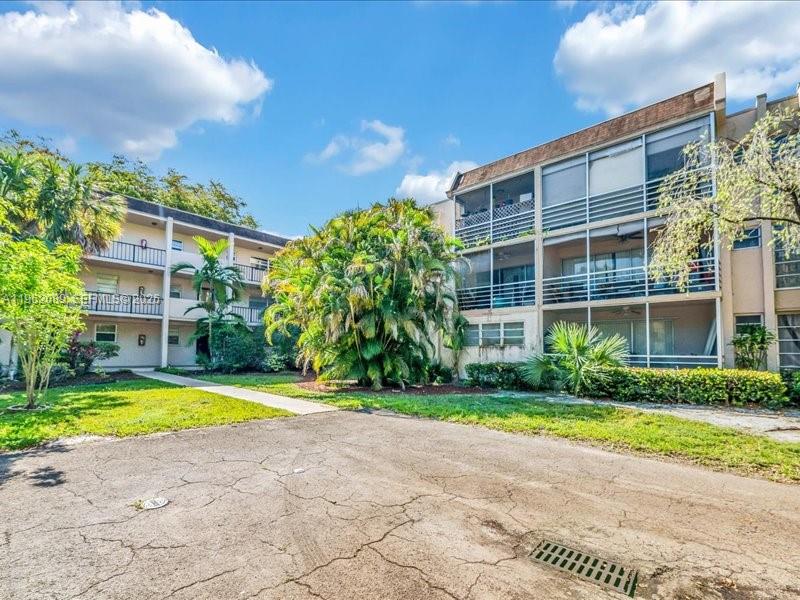 2 Bedroom 2 Bathroom wood laminated floor, centrally located in the heart of Plantation, this property offers convenience, accessibility, and strong potential. Situated along Pine Island Road, enjoy easy access to major highways, shopping, library, NSU, dining, and everyday essentials. The community is close to Broward Mall, Plantation Walk, parks, and medical facilities, with quick commutes to Fort Lauderdale and surrounding areas. Ideal for an owner-occupant seeking a well-located opportunity in Broward. Minimum credit score 650 per association. Disclosures, Rules, Application Information, etc. are attached in listing . Easy to show. Option to rent immediately  with tenant lease. Assigned parking space, two cars option.  Community poll accessible, low association fee includes water, trash and pest services.