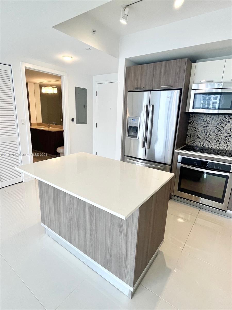 Unit #1405 at 5300 Paseo is beautiful and spacious one bedroom one bath apartment with open city views. Unit features white porcelain tile floors throughout, white quartz countertops, stainless steel Whirlpool appliances, and European hardwood cabinetry. Enjoy the incredible location at the center of Downtown Doral, just steps away from the incredible restaurants, shops, and many golf courses of the area. Building amenities include state of the art gym, infinity pool, children’s play room, spa area with sauna and private massage room, club house, and business center. Unit comes with one parking space.