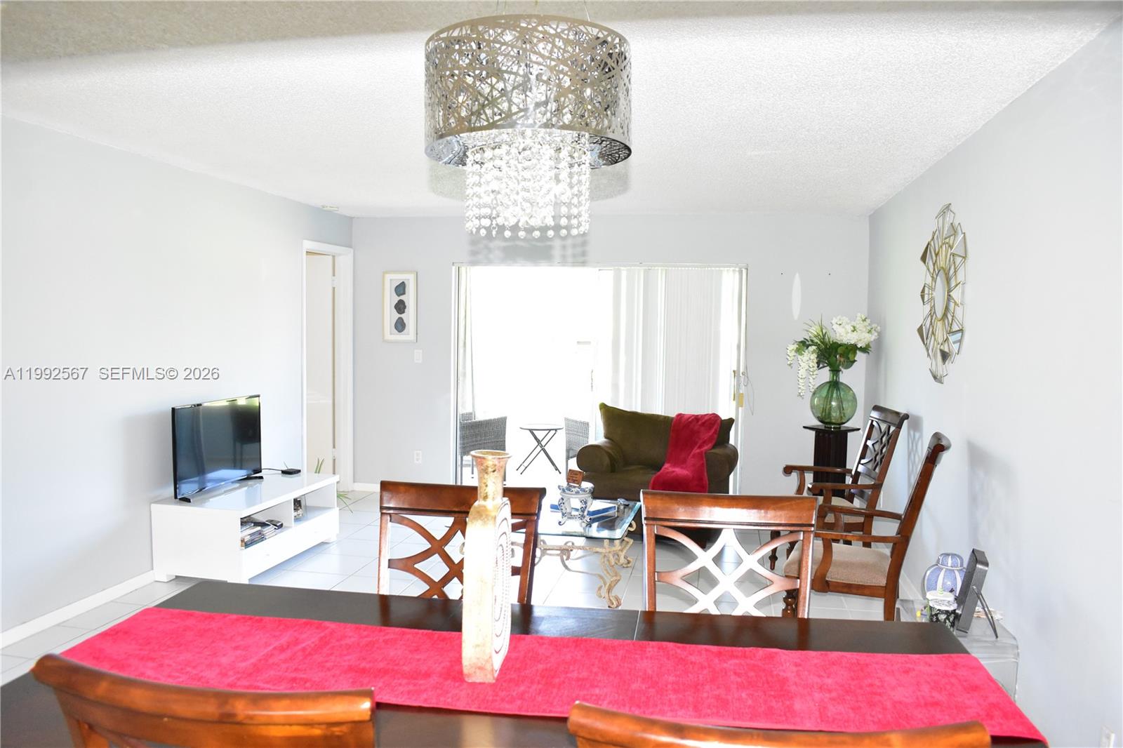 Well located in Phase 3 of Sunrise Lakes, this large 2/2 condo features a kitchen with nice appliances, an updated master bathroom and a relaxed view from the balcony to a fountain with color hanging lights at night.  Bus stops nearby make transportation easy and there is plenty of parking for guests.  Sunrise Lakes Phase 3 is a 55+ community which features plenty of activities daily as well as weekly dances, movies, bingo etc.  A free executive golf course is included in the maintenance as are 10 pools, a gym, pickleball courts, tennis and indoor racquetball.  To top it all, your maintenance here includes, cable, WIFI, monthly pest control and a service contract with Total Appliance which will repair anything that may happen to any of your house appliances and even do minor plumbing and electrical repairs.  Don't miss your chance to live among new friends and enjoy the value Sunrise Lakes Phase 3 offers!