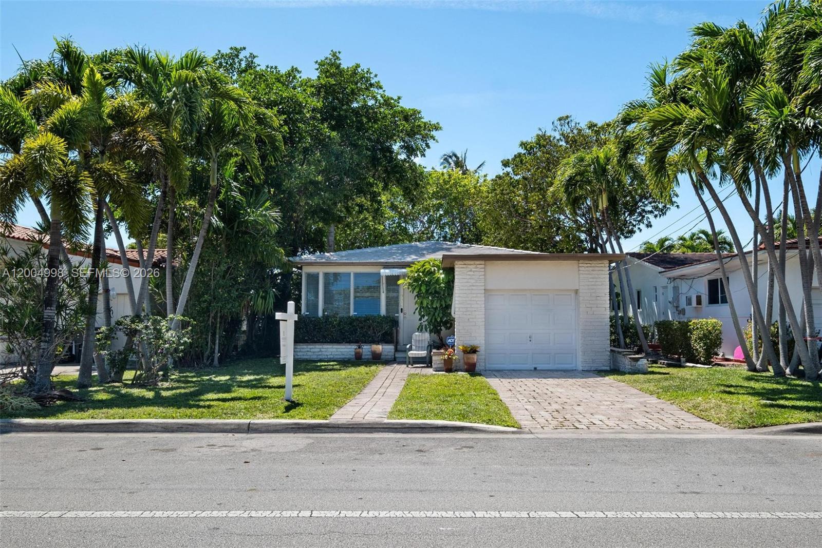 Situated in the heart of one of South Florida’s most coveted coastal enclaves, 9516 Byron Avenue presents a premier opportunity for a visionary homeowner or savvy investor. This property offers the rare versatility to either meticulously renovate the existing structure into a modern beachside retreat or clear the site to build a custom luxury estate from the ground up. Located just steps from the pristine sands and turquoise waters of Surfside, the neighborhood is celebrated for its quiet, upscale residential feel while remaining within walking distance of world-class dining and the high-end shops at Bal Harbour. Whether you choose to preserve its original charm or create a contemporary masterpiece, this location ensures a lifestyle of unparalleled convenience and coastal elegance.