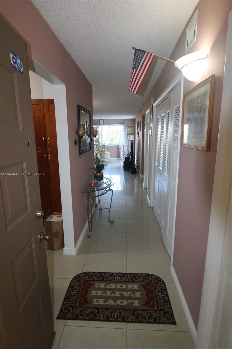 centrally located building. Featuring a large corner unit, with great open layout. Very well kept, bright, remodeled unit, 2 Bedrooms and 1 Bathroom with 2 large balconies. Master bedroom balcony with view to a pond. New kitchen, with high ceiling, wood cabinets, and granite counter tops. Top of the line Samsung stainless steel appliances. New floors with 20 x 20 rectify ceramic tiles all through the unit. New central A/C deigned to turn off if there is a leak. Many ample closets to choose. Very large master bedroom with waking closet. Building with Pool and tennis course. As per owner building already passed the 40 years inspection.