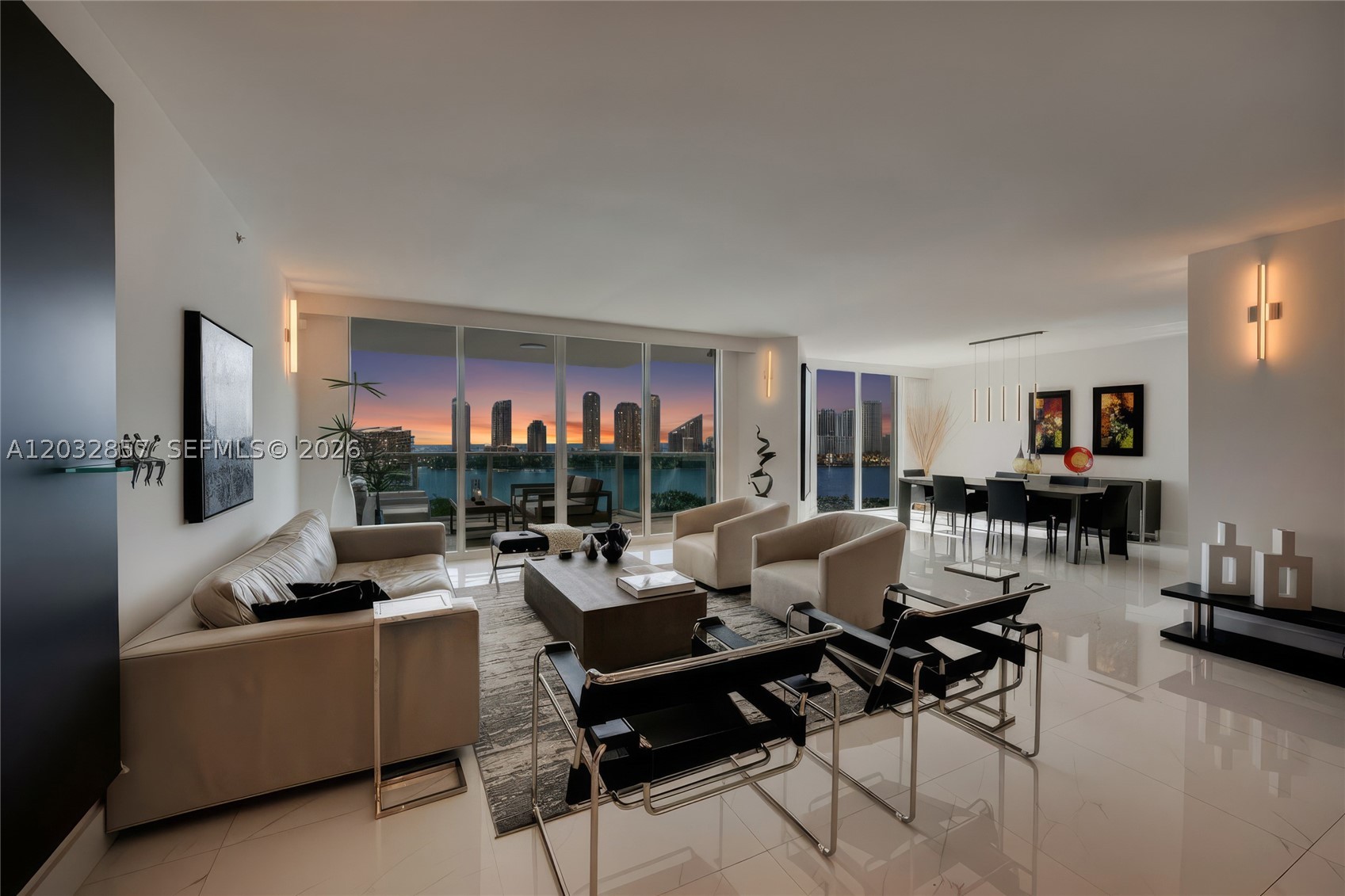Stunning highly renovated 3 bedroom + den apartment in the sought-after line 06 at Peninsula Condominium. Updated kitchen & bathrooms, new porcelain tile flooring. Kitchen features quarzo countertop, new Miele appliances and a wine cooler. Enjoy breathtaking views from both balconies: east one facing the intracoastal and the ocean and west facing beautiful city and marina views. 
Private foyer, big laundry, two assigned and covered parking spots + valet parking and one storage cage. Five star amenities, including two pools, barbecues, two gyms, two spas with sauna, steam and cold plunge, social rooms, party venues, two tennis courts, two pickleball courts, dog park, game room, toddler's room, poker room, coffee bar, 24 hours security, electric vehicle chargers, and much more. Resort living at its best.