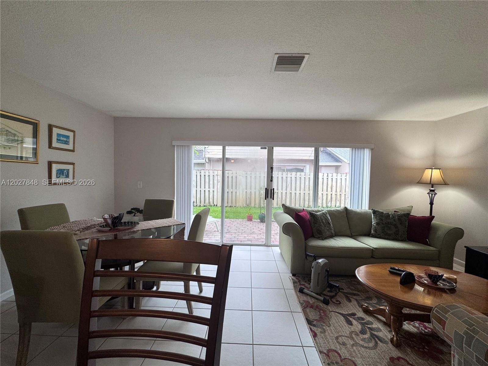 Beautiful 3 bed 2.5 Bath Townhouse In Sunrise-just steps from Sawgrass Mills Mall, Top rated Schools, Parks and Dining.VAulted Ceilings, tiled and wood Floors, Spacious Layout, and Style. 6 Year old Roof Hoa fees Cover Roof, Exterior Pinting, Homeowners insurance, yard care, Trash Pickup and Access to the community Pool. Plenty of guest parking and one parking assigned. No HOA Approval Required. Side storage adds convenience. Perfect blend of value, Location and Lifestyle.