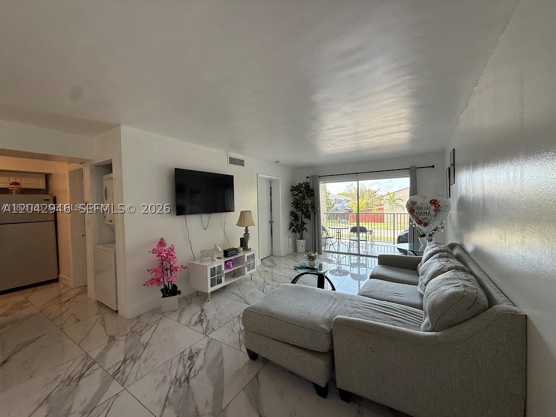 Exceptional investment opportunity in the desirable Kendall Lake Towers community. This renovated 1-bedroom, 1-bath residence features contemporary finishes, stainless steel appliances, and an in-unit washer and dryer for added convenience. Located within a gated community near shopping, dining, and major conveniences. Currently tenant-occupied with a lease in place through January 2027 at $1,900 per month, providing immediate and stable rental income. A turnkey property ideal for primary residence or investors seeking strong cash flow and long-term value.